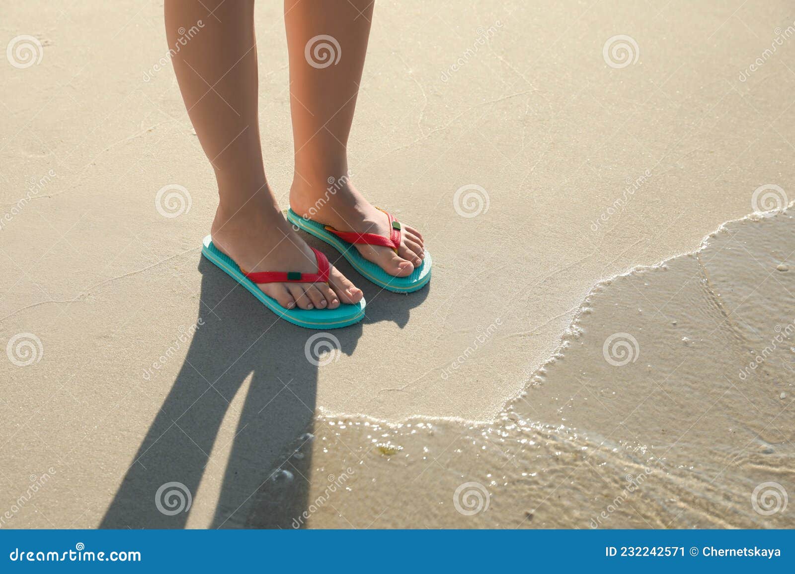 Woman Wearing Flip Flops on Sandy Beach, Closeup Stock Image - Image of ...