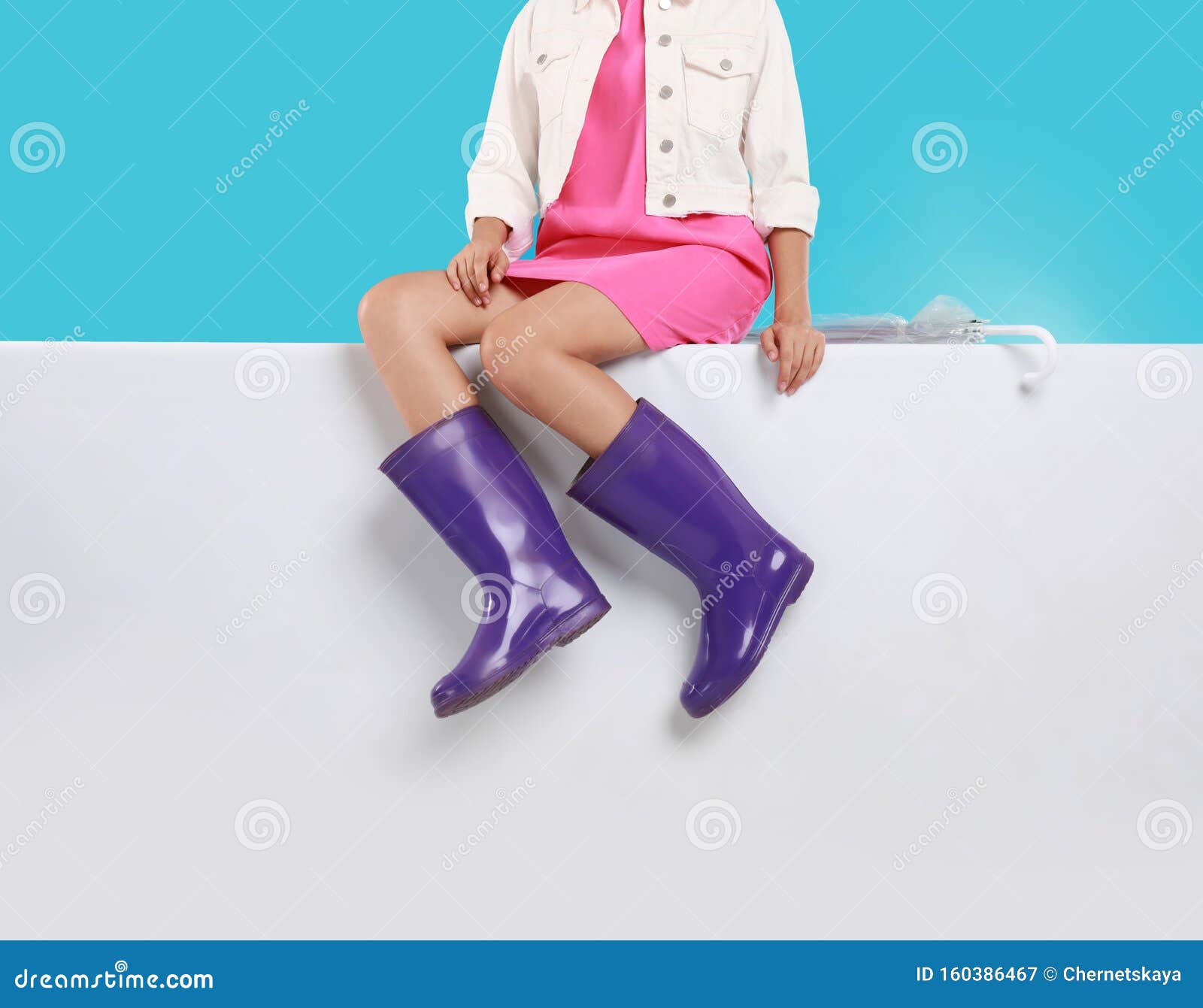 Woman Wearing Gumboots on Color Background. Stylish Rubber Shoes Stock ...