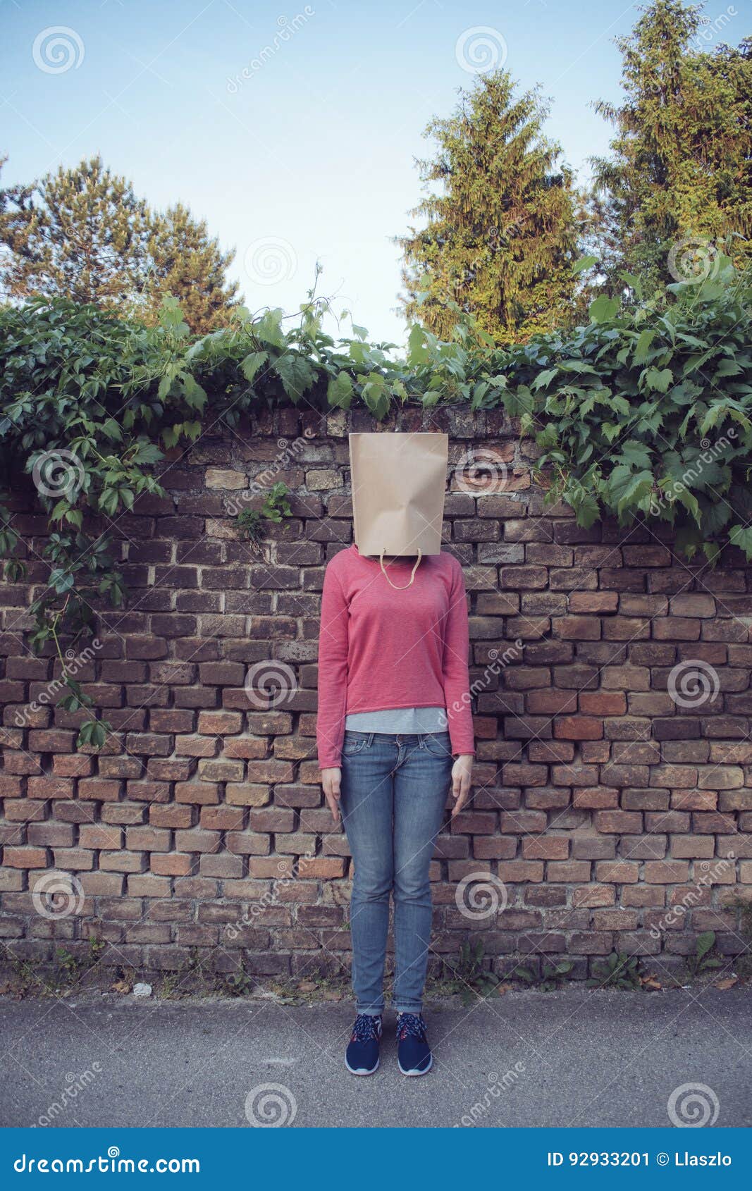 Woman wearing paper bag stock image. Image of outdoor 92933201