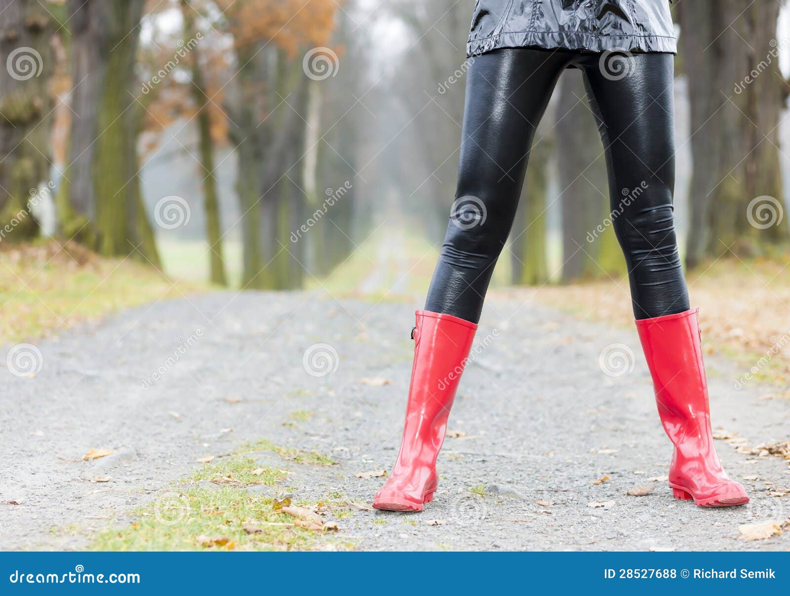 Woman Wearing Red Rubber Boots Stock Photo - Image of style, black ...