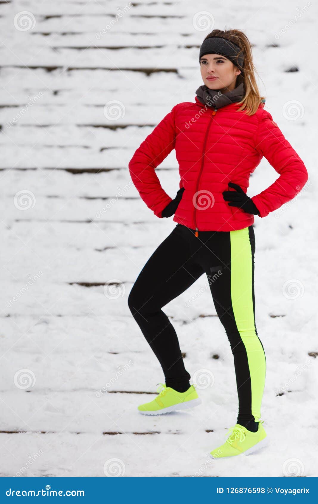 Woman Wearing Sportswear Exercising during Winter Stock Photo