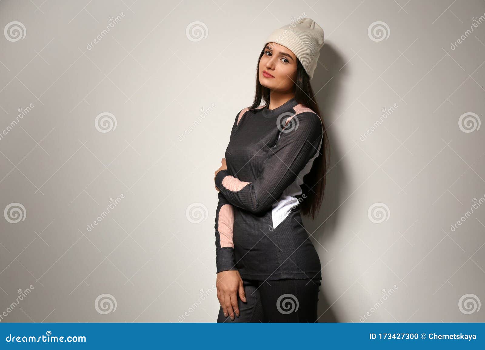 Woman Wearing Thermal Underwear and Hat on Grey Background. Winter ...