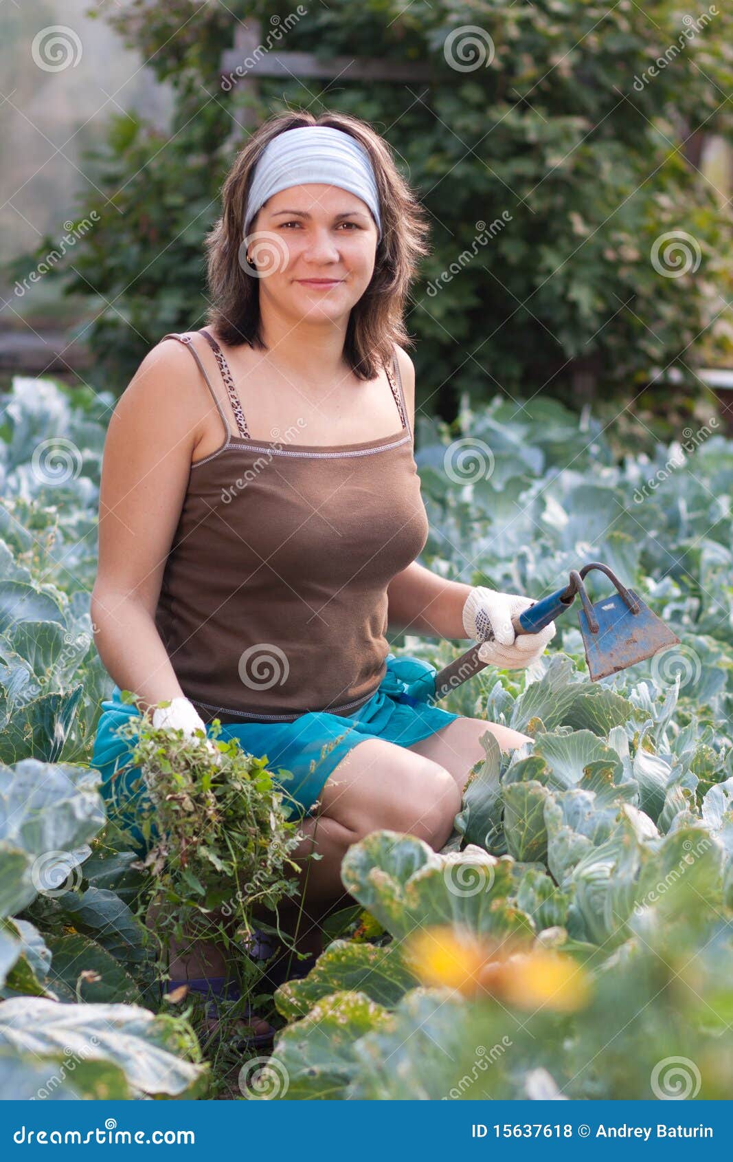 woman weeding vegetable garden