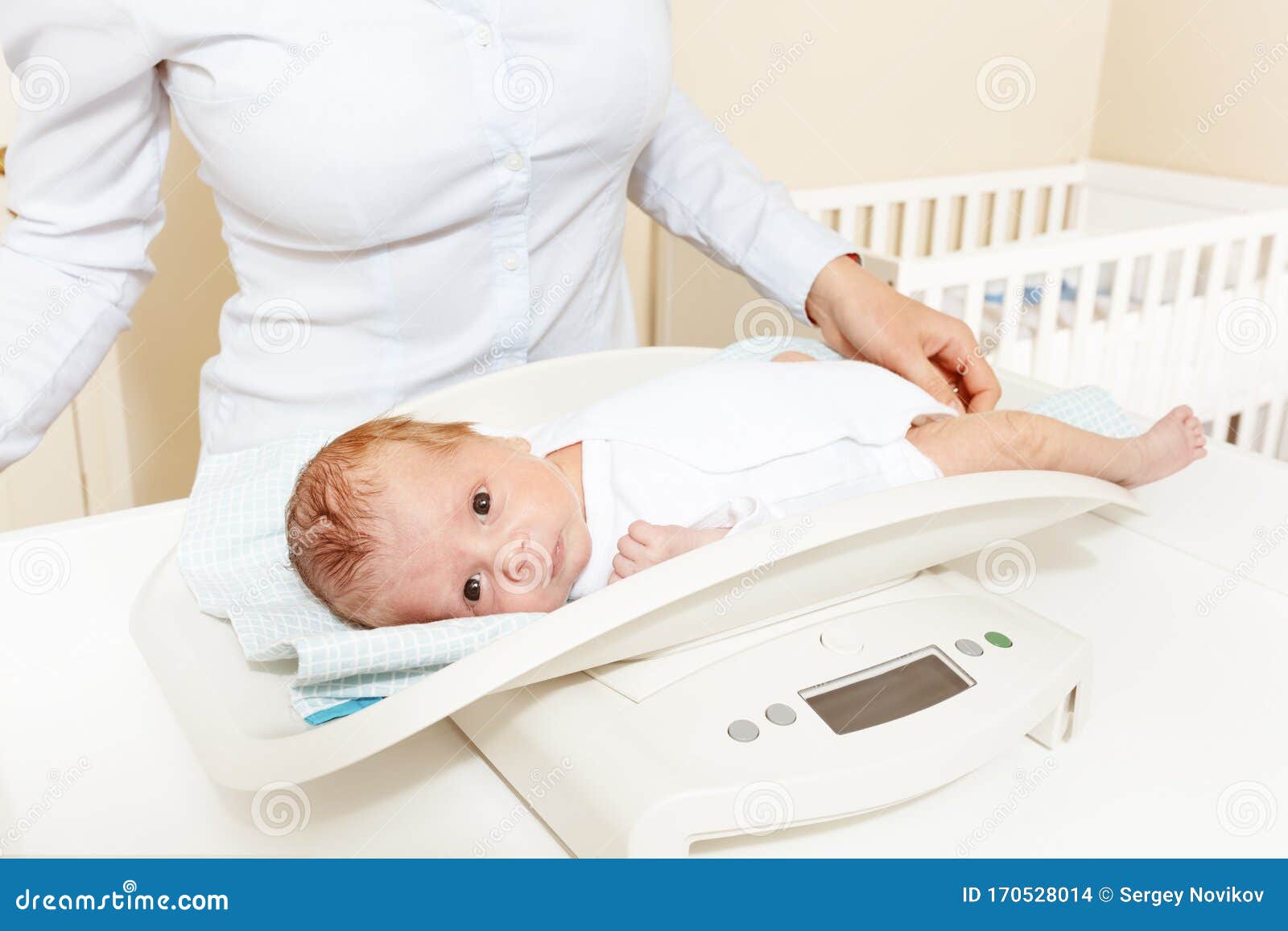 Weighing a Newborn Baby on a Scale in a Maternity Hospital, Isolated O  Stock Photo - Image of white, medicine: 276647452