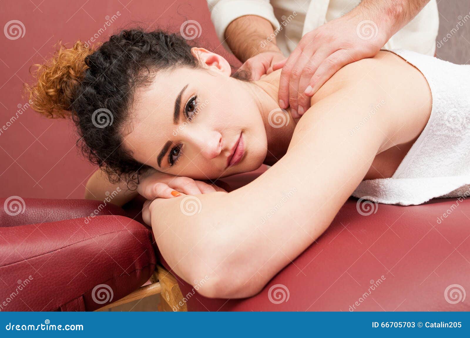 Woman In Wellness Spa Center Having Back Massage Stock