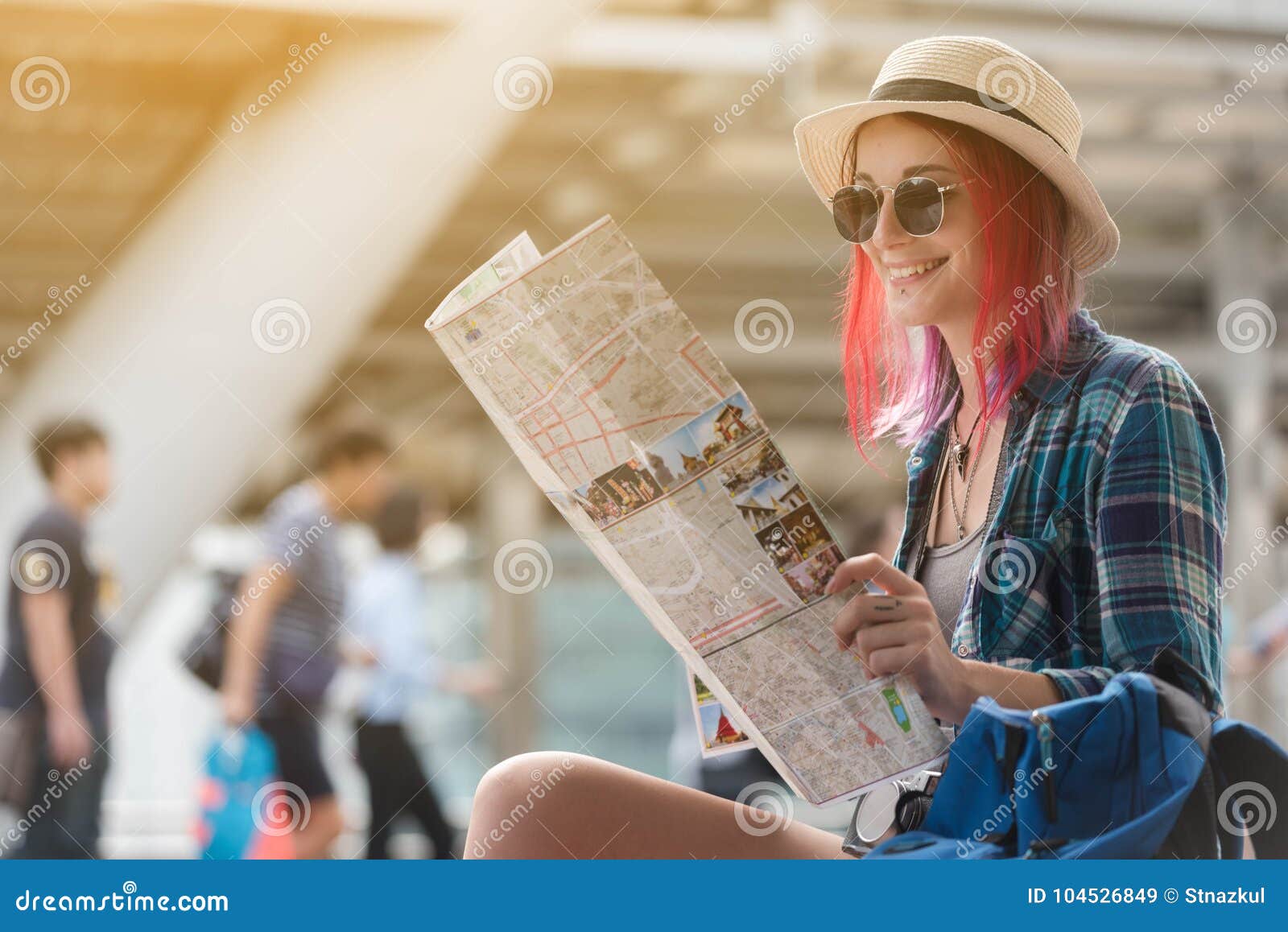 woman westerner looking at map during city tour in the morning,