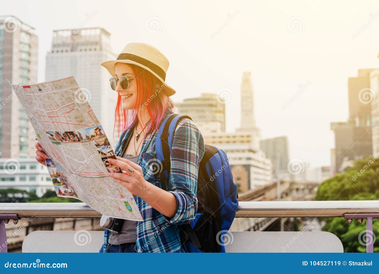 woman westerner looking at map during city tour in the morning,