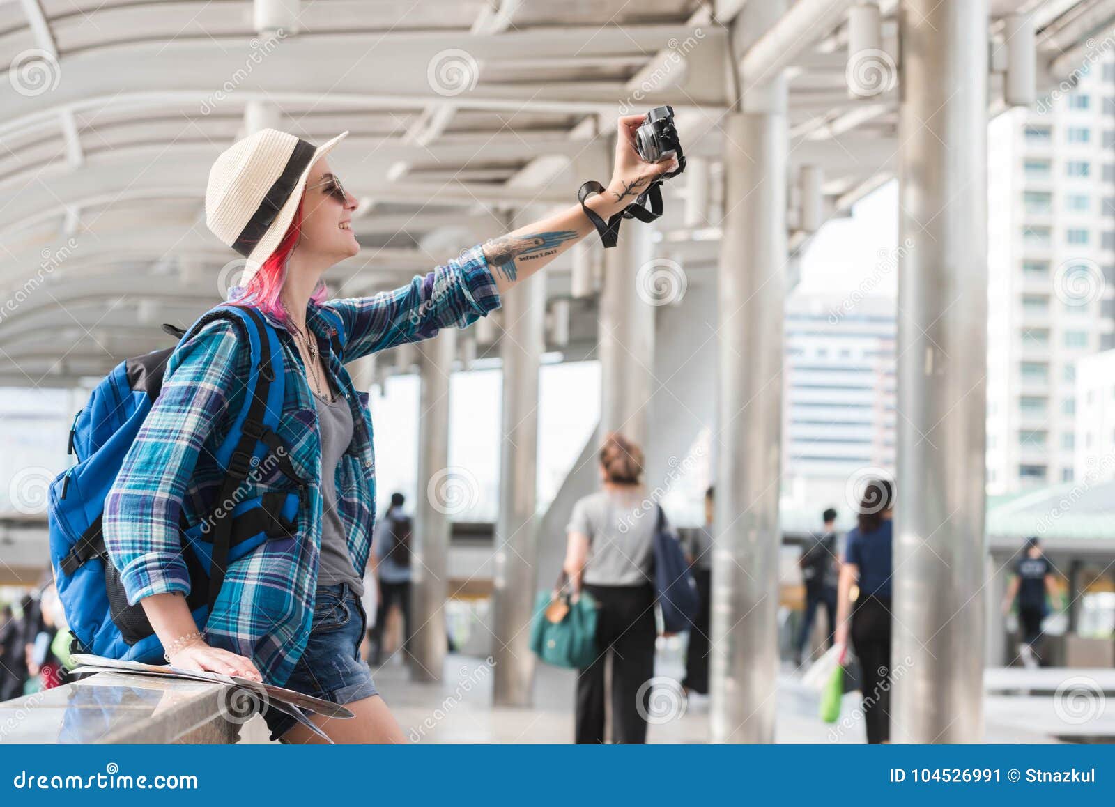 woman westerner taking selfie during travel in city happy moment