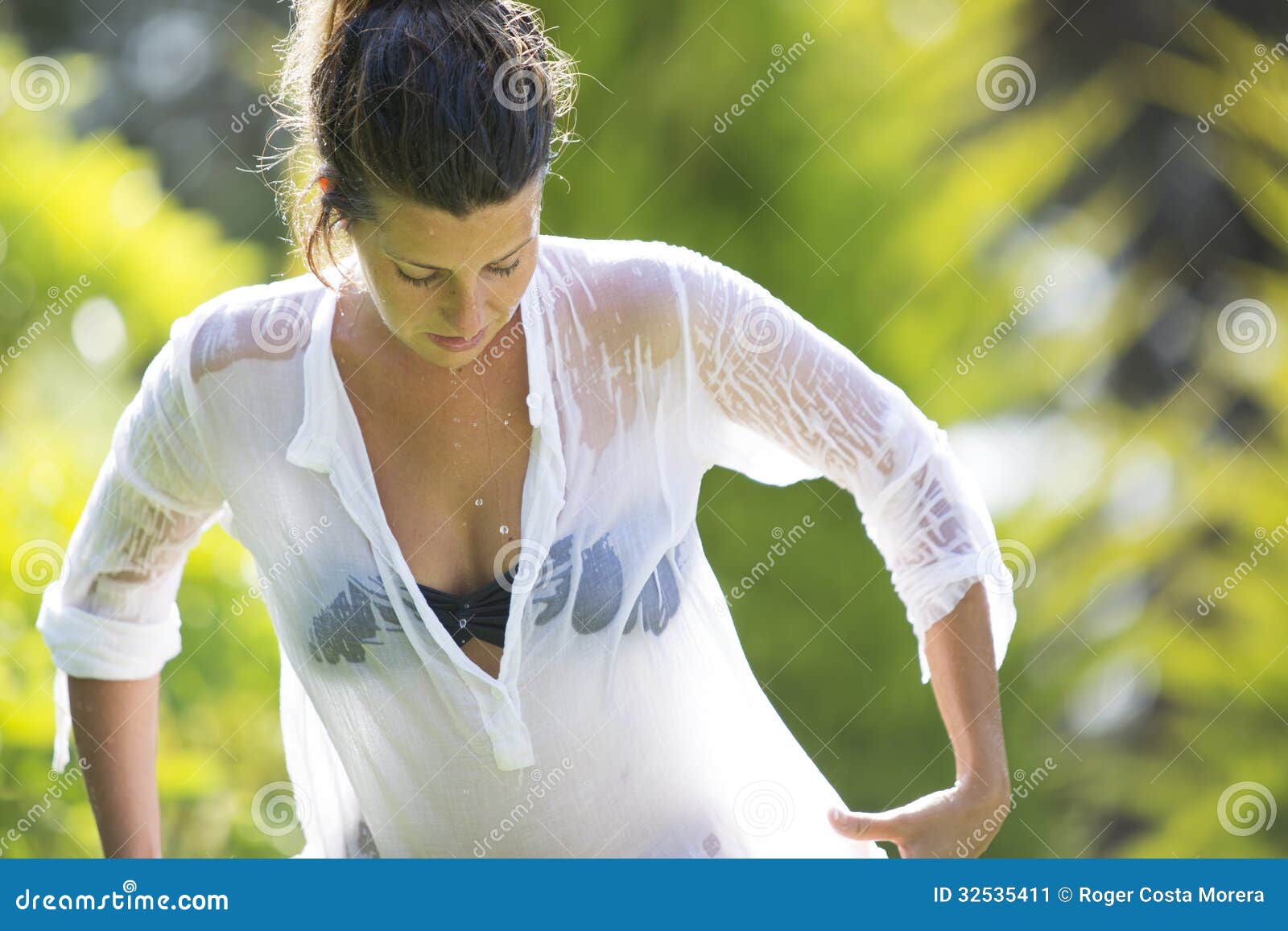 Woman In Wet Shirt Stock Photo 32535411 - Megapixl