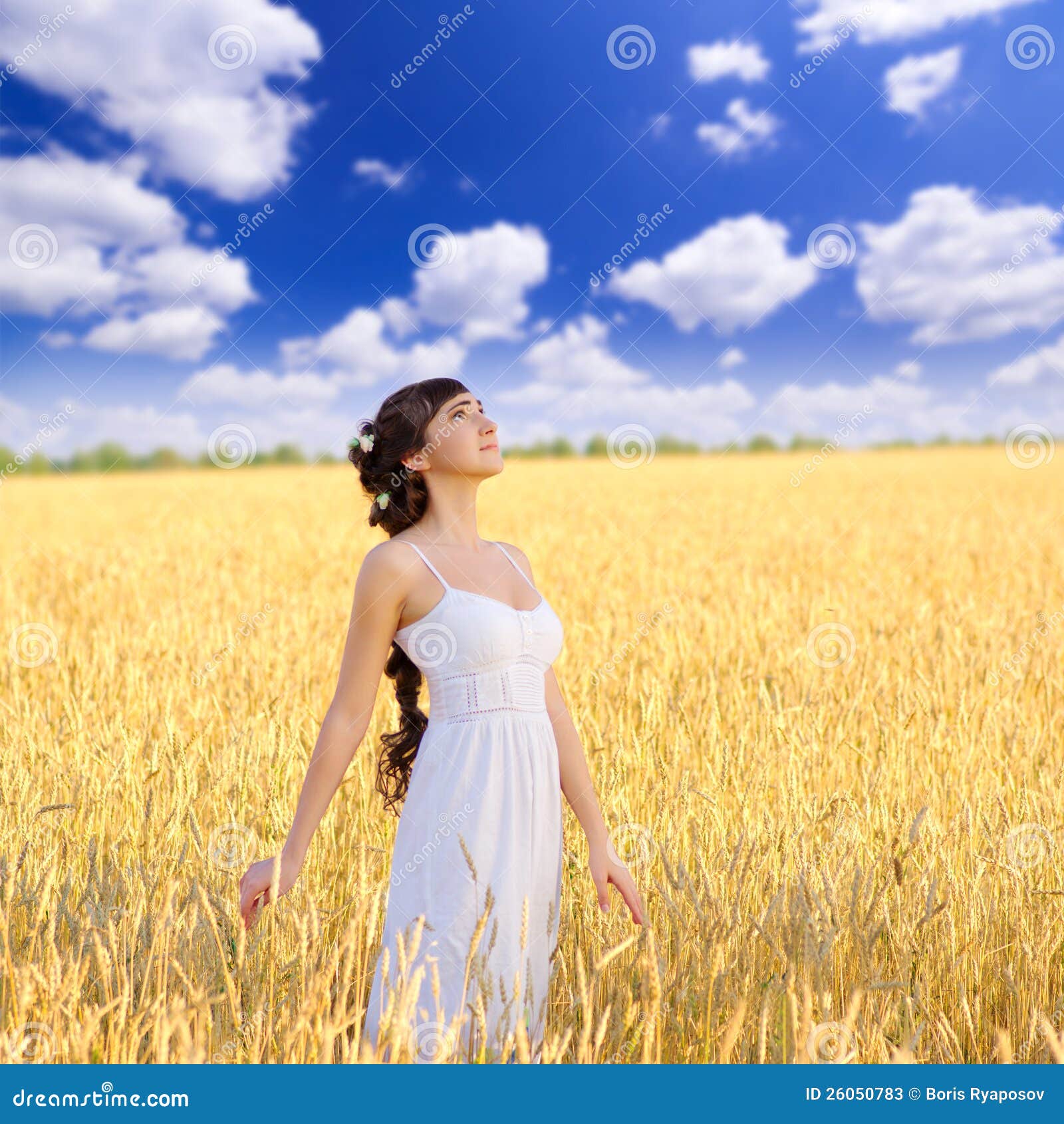 Woman in a wheat field — Stock Photo © Xalanx #2254890