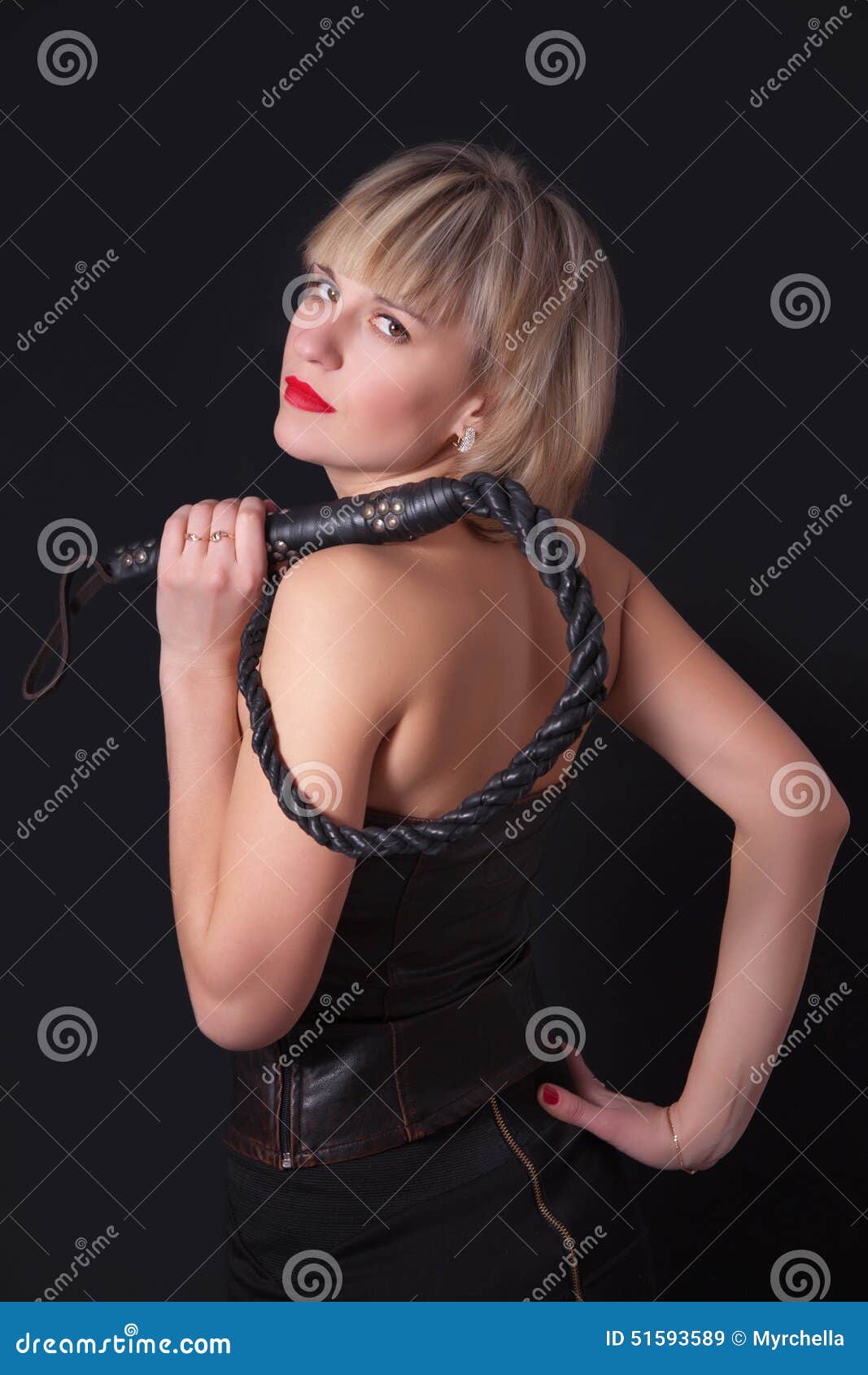 Woman with a Whip in Her Hand Stock Image - Image of fashionable