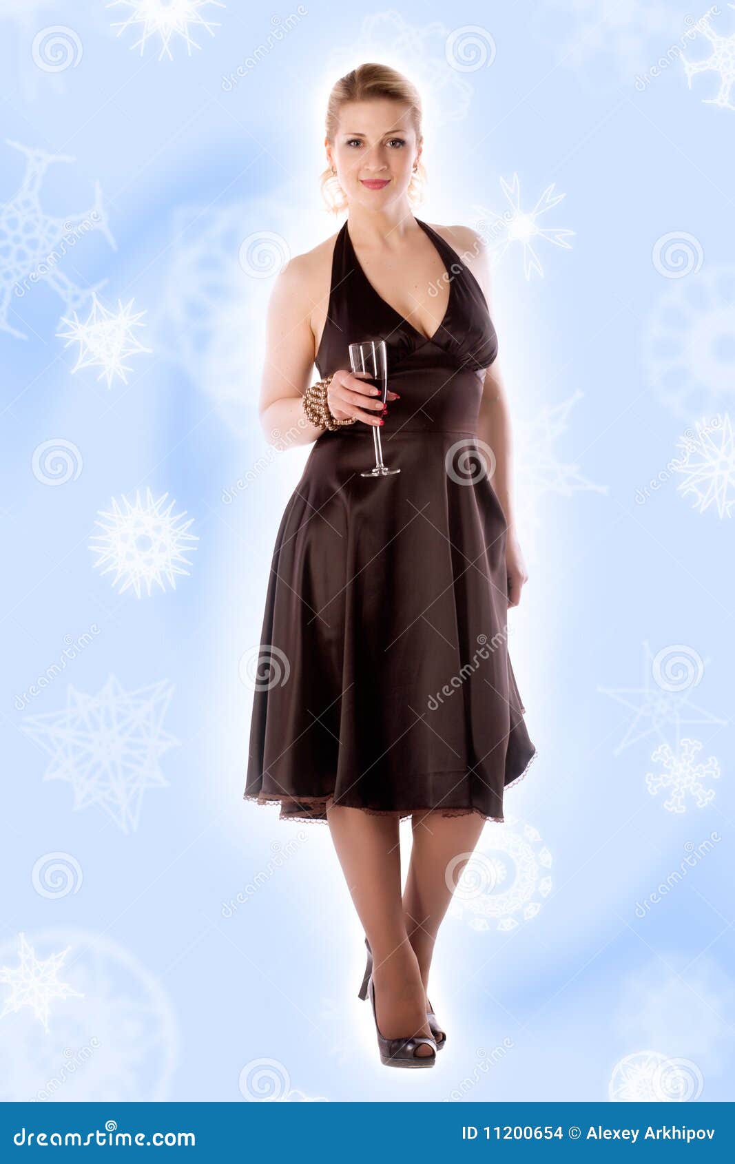 Woman on a white background. Woman in brown dress with a glass of wine on a white background