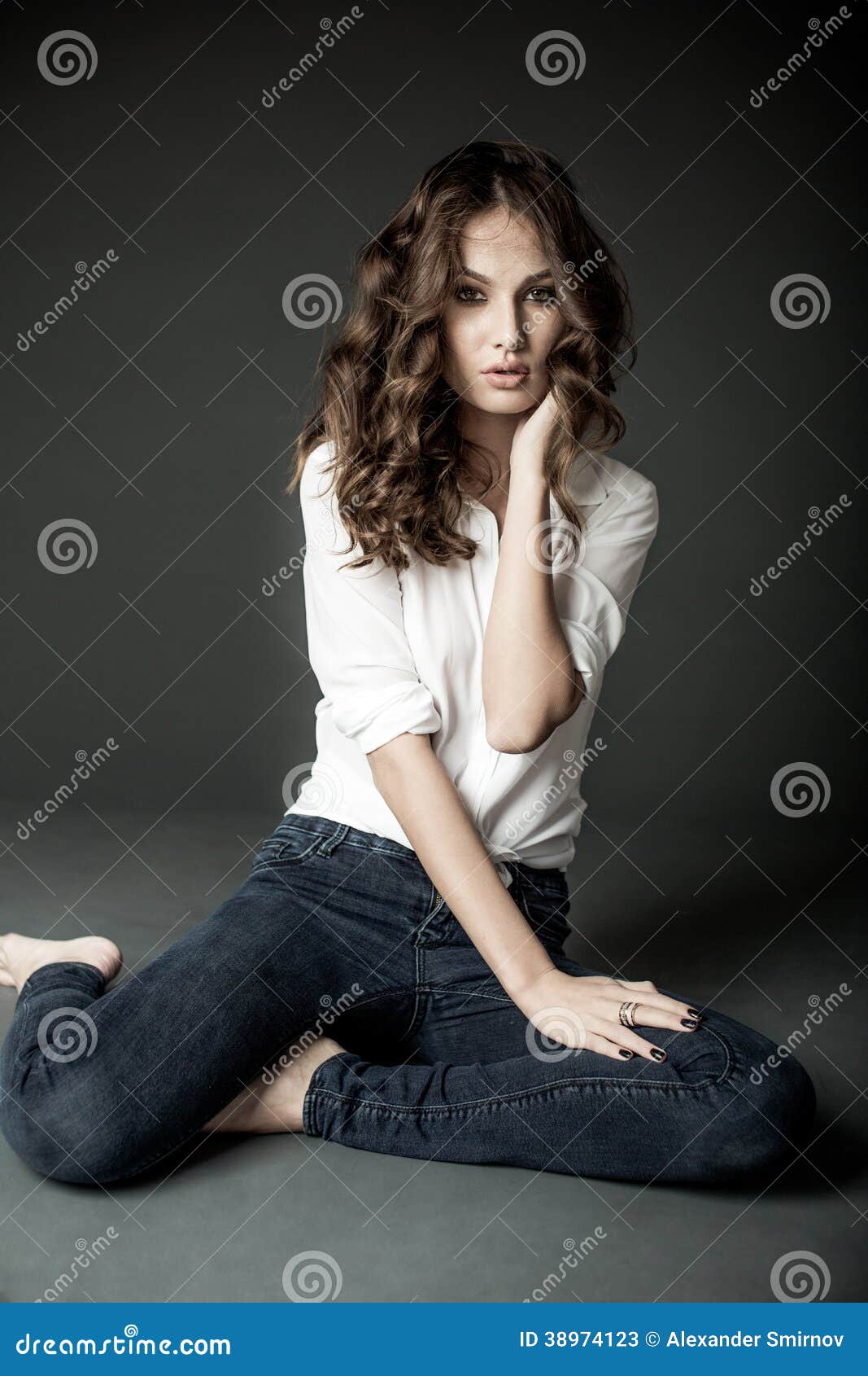 Woman in White Blouse and Blue Jeans Stock Image - Image of showing ...