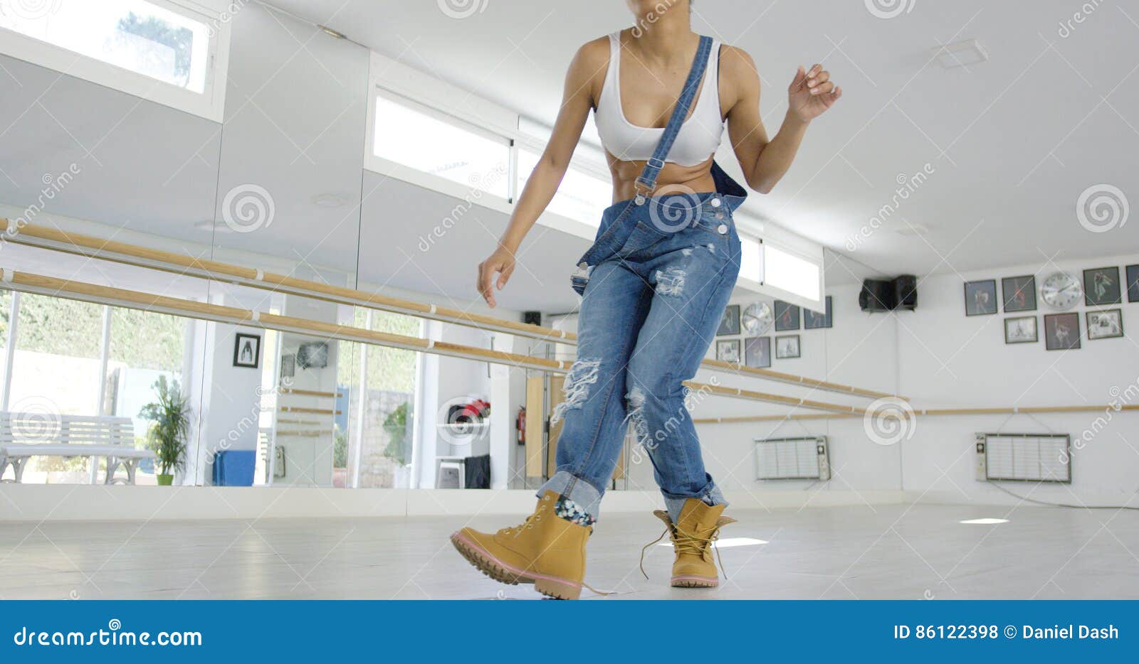 Woman in Work Boots and Overalls Dancing Stock Photo Image of health