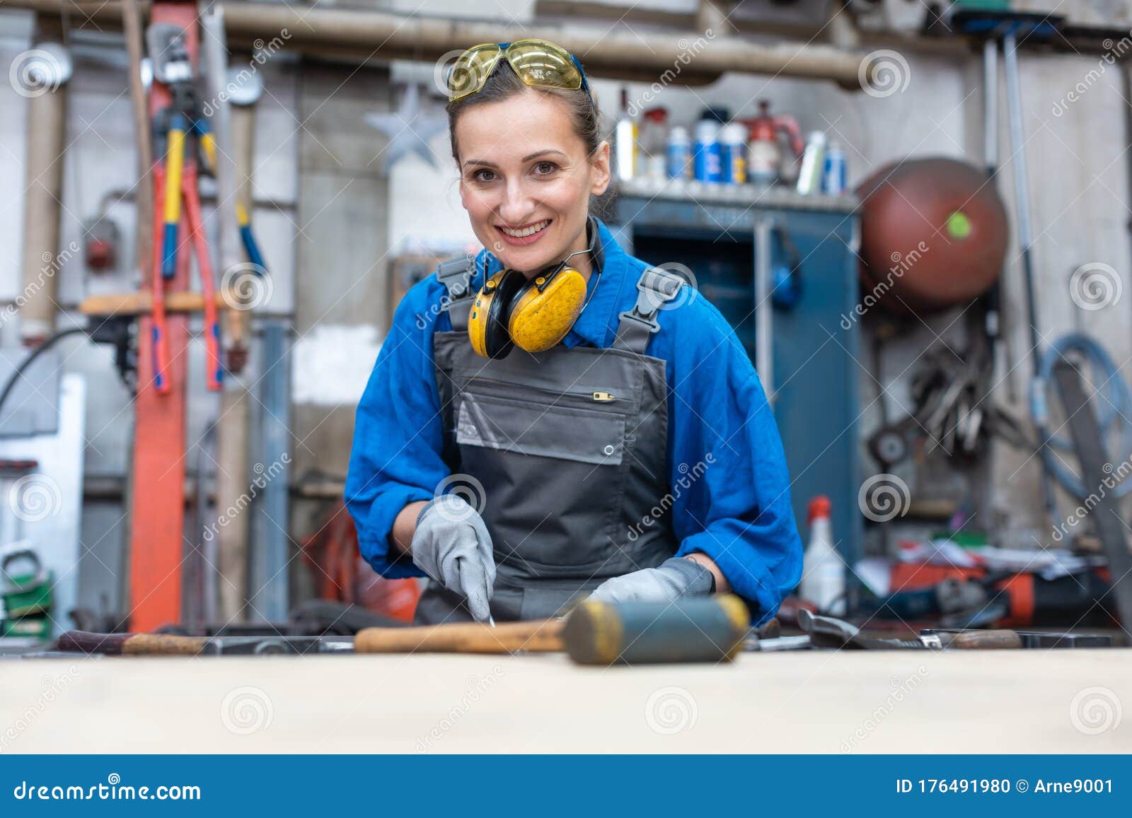 Woman Worker Marking Workpiece in Her Stock Photo Image of
