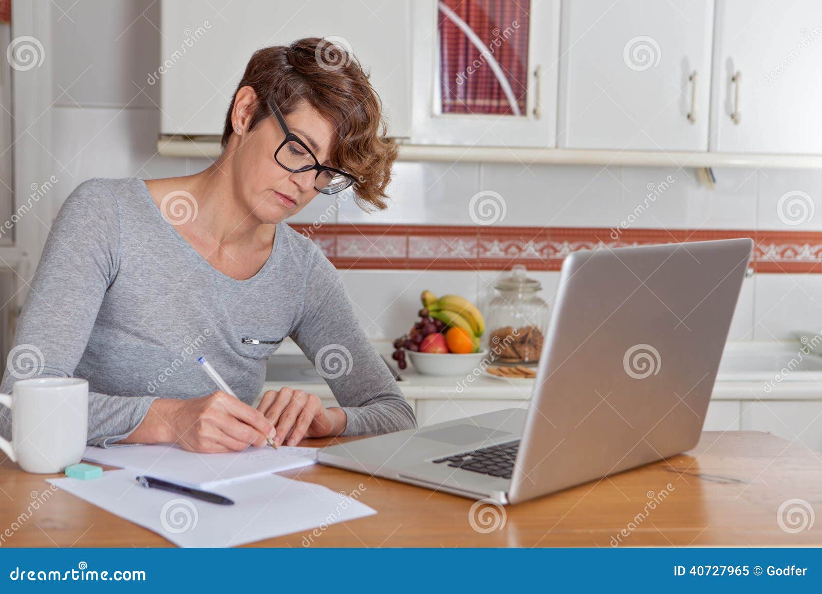 woman working or blogging in home office.