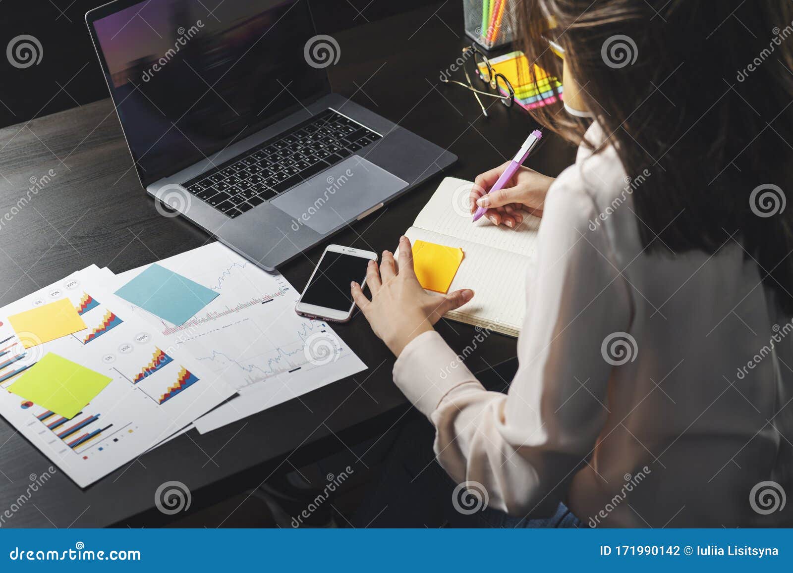 Woman Working On Laptop Manager Sitting At Office Desk And