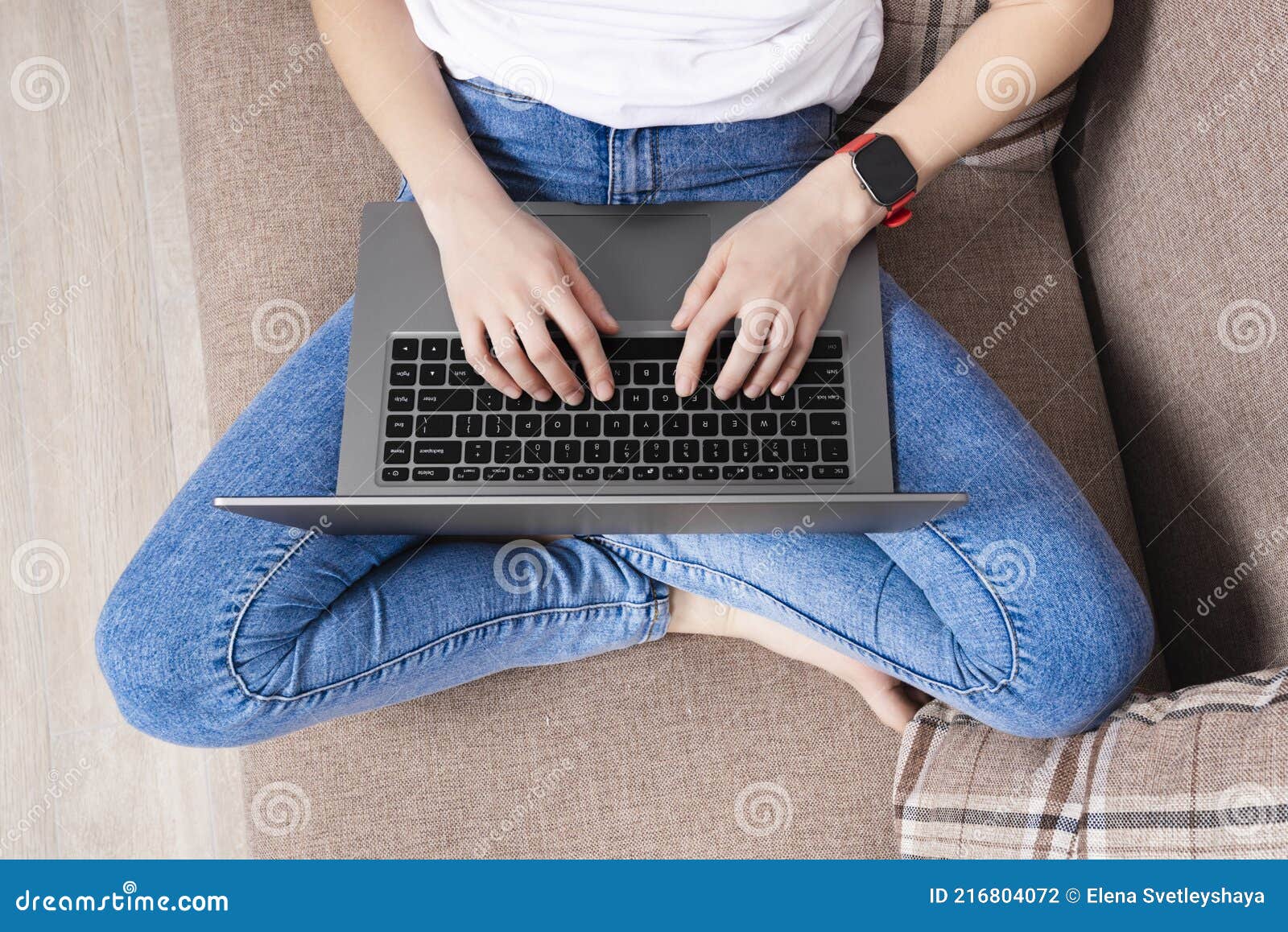 woman working on the laptop in modern space. top view. home office or online education concept. impersonal concept