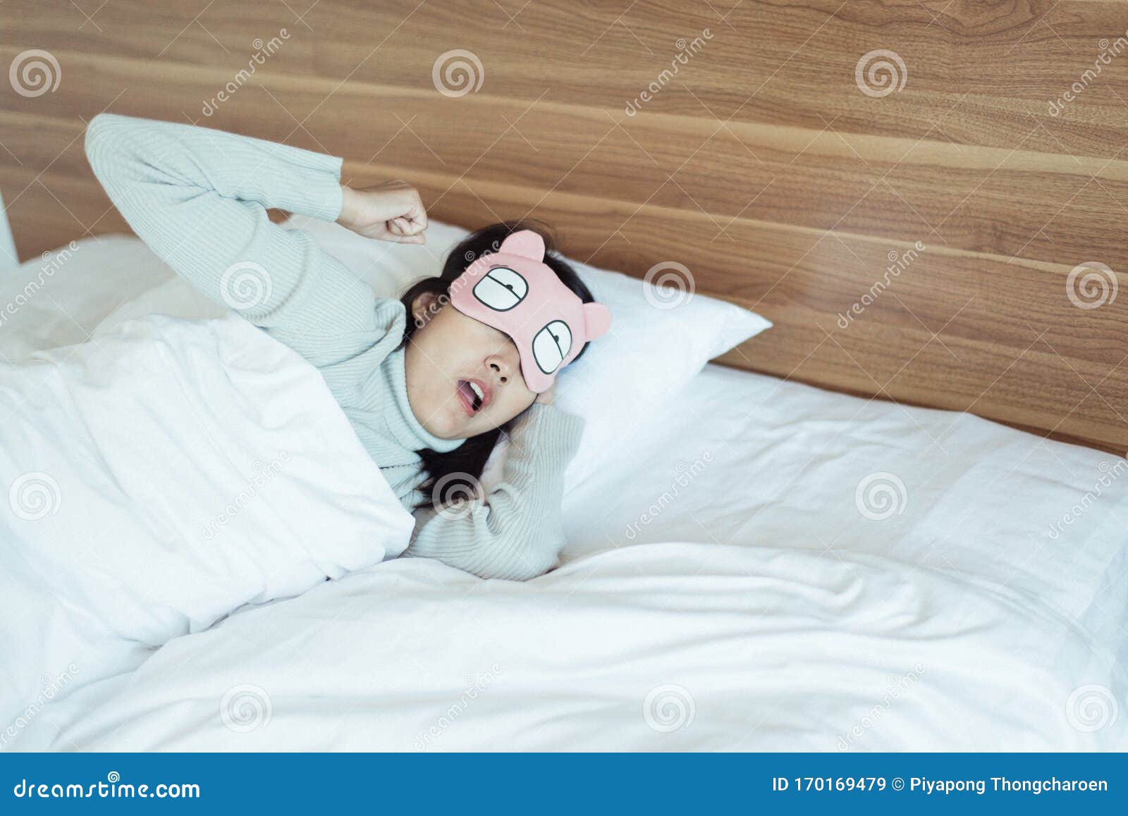 woman yawning on her bedroom and tired sleepy,symptoms and sleepiness