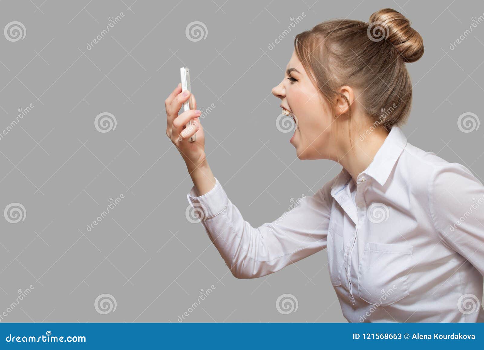 woman yelling into the phone