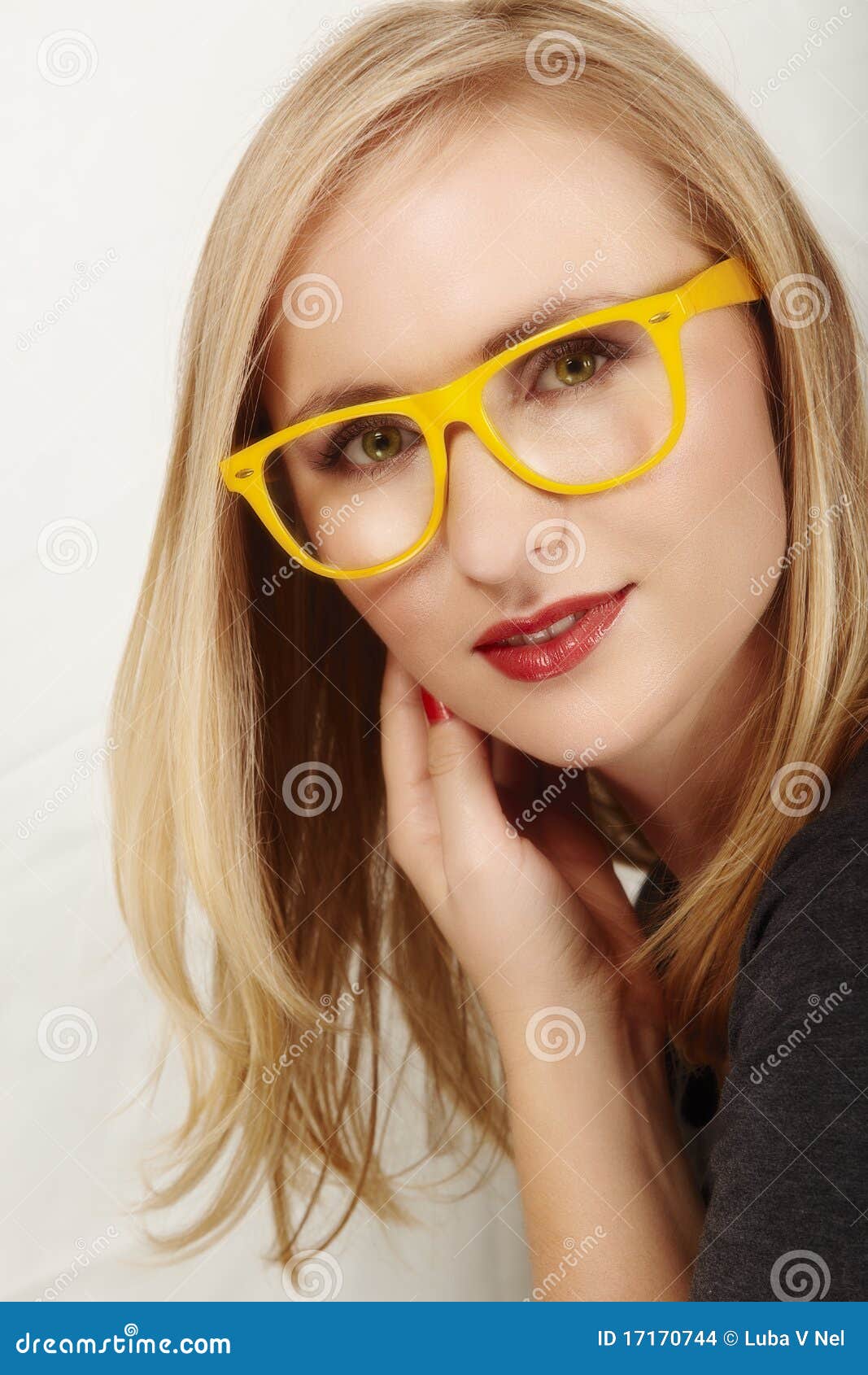 Woman with yellow glasses. stock photo. Image of glasses 17170744