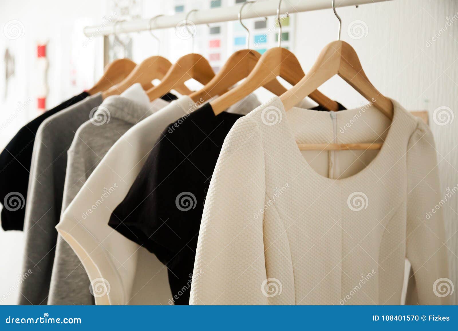 women clothes hanging on hangers clothing rails, fashion 