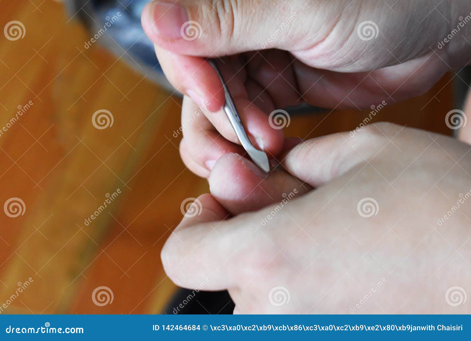 Women are cutting toenails stock photo. Image of clear - 142464684