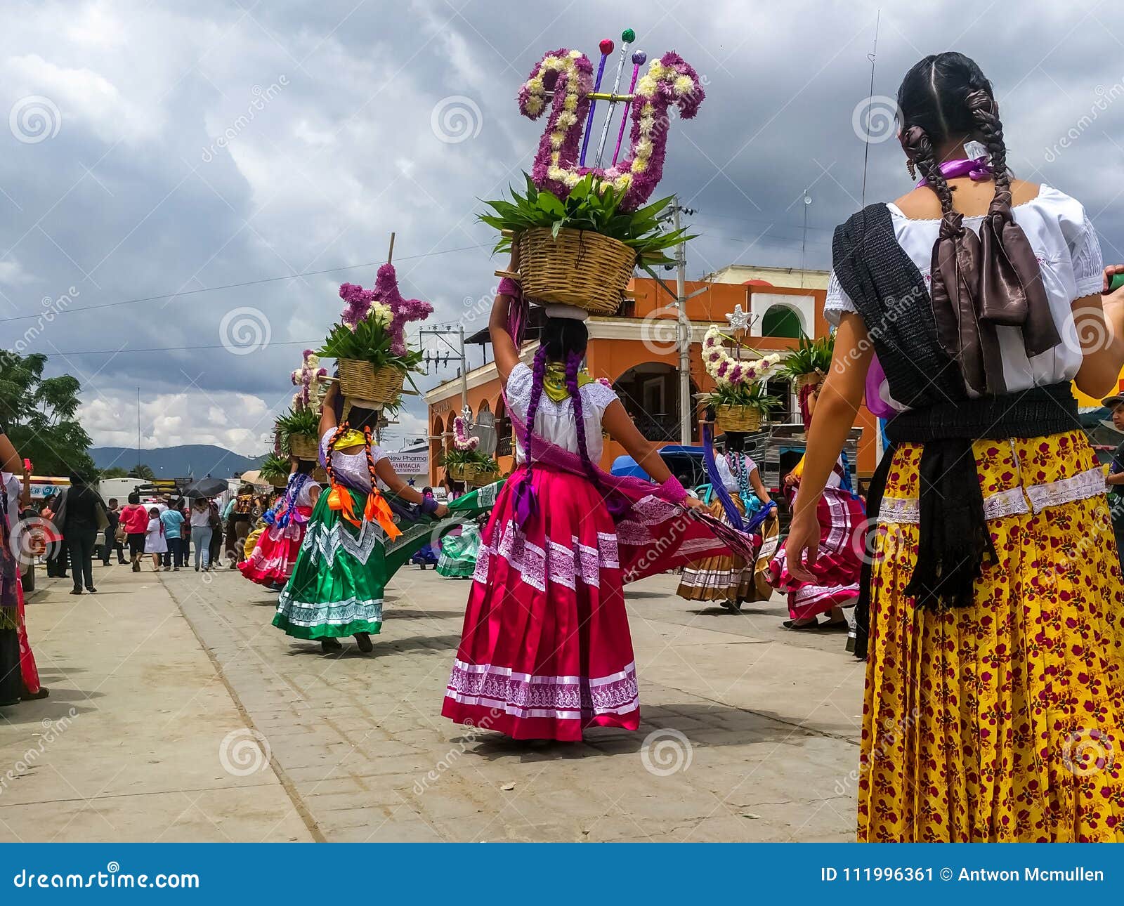 Women Dancing through the Streets with Offerings at the Guelaguetza ...