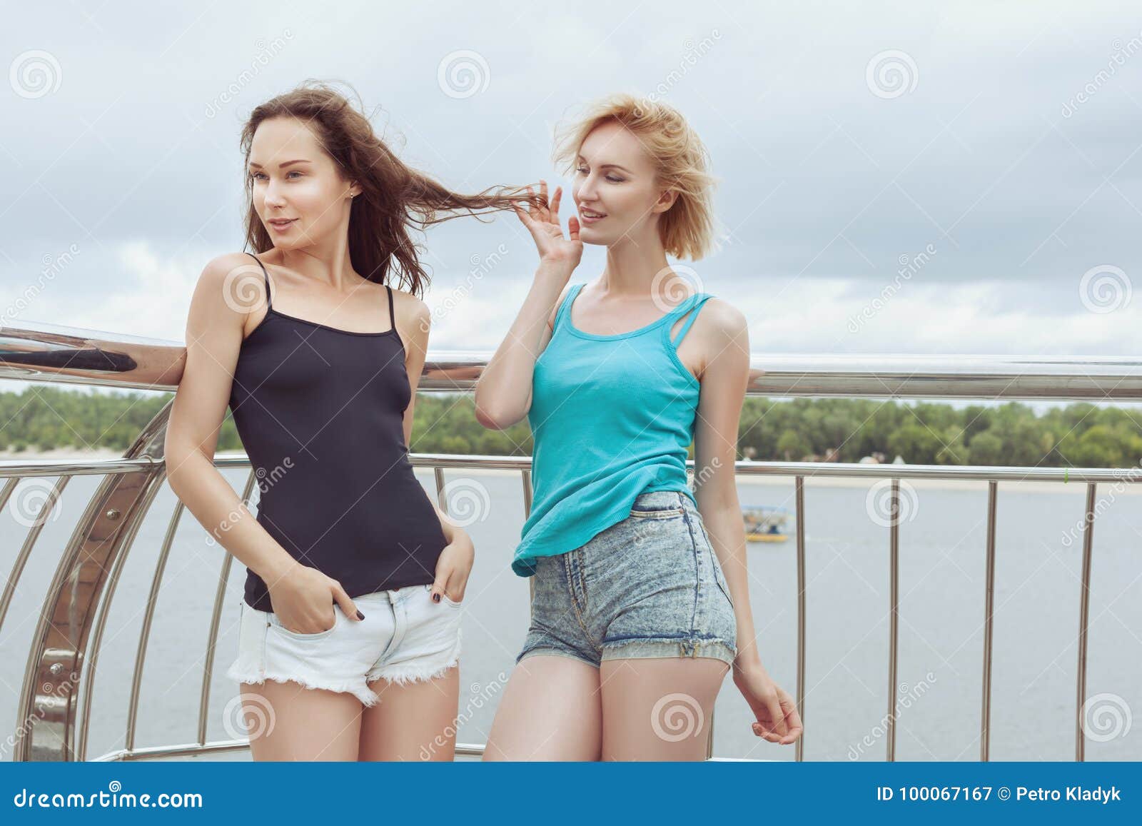 Women Flirt With Each Other Outdoors. Stock Image - Image of female ...