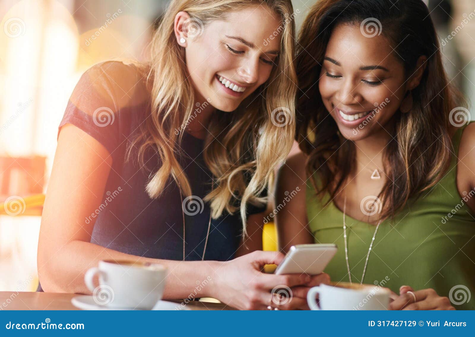 women, friends and coffee shop with cellphone or funny meme with laughing, social media or restaurant. female people