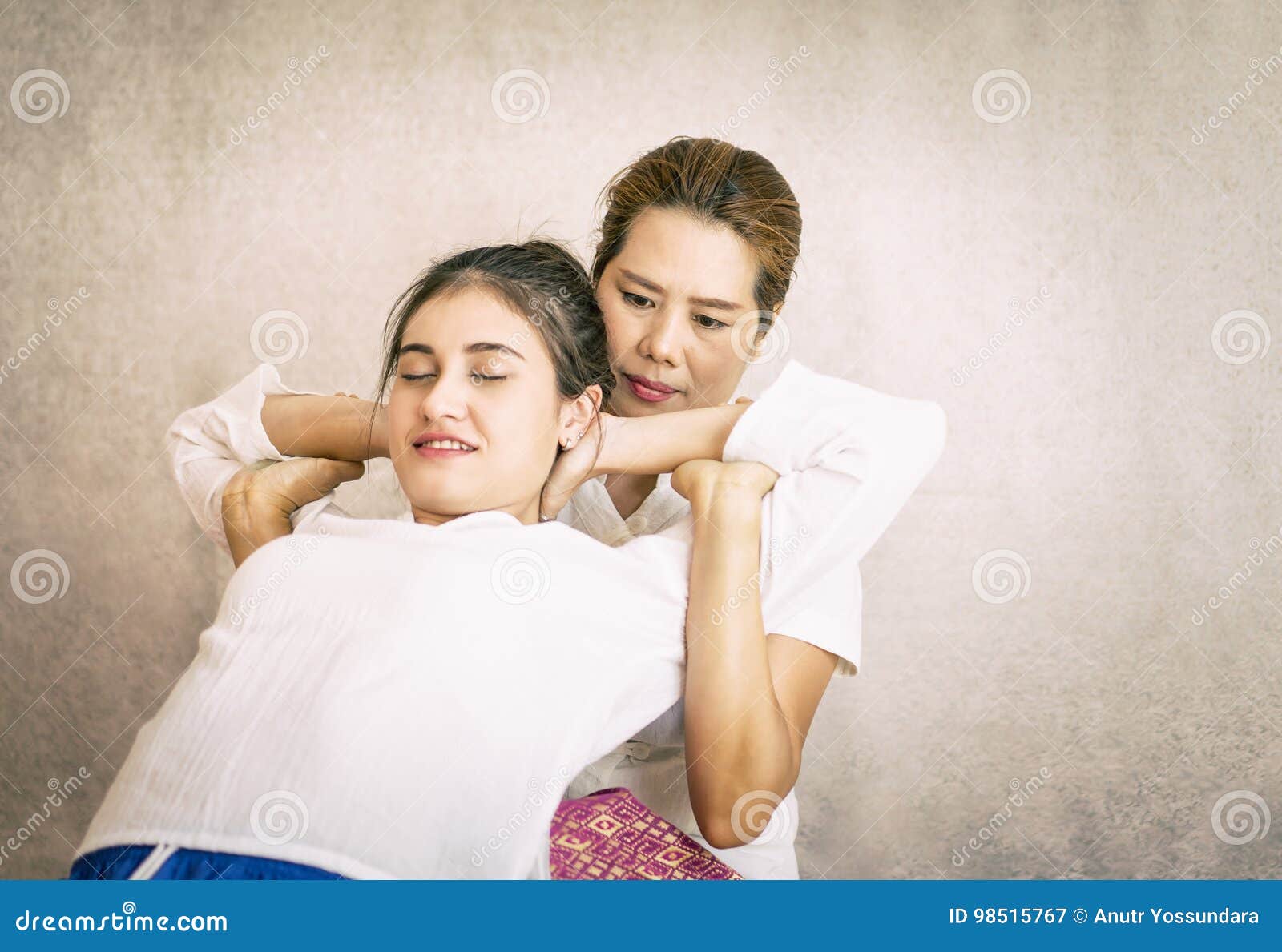 Women is Getting Her Back Stretch in Thai Massage Stock Image Image