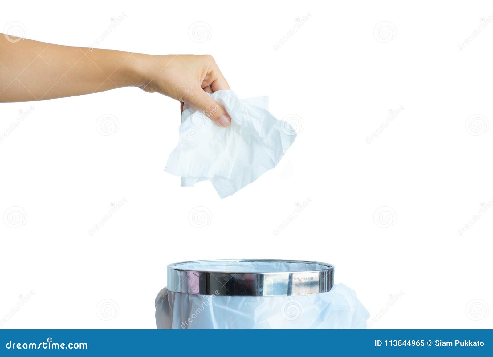 women hand throwing white tissue paper in to a trash bin