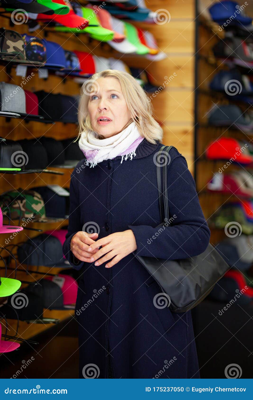 Women in a Hat Store Chooses a Hat. Stock Photo Image of buyer, retail 175237050