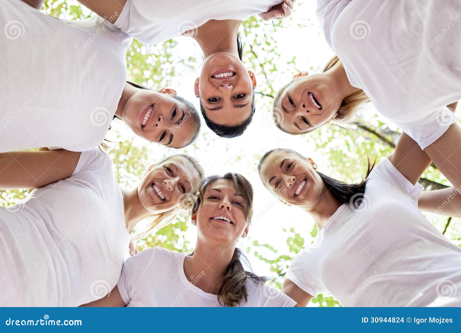 Women with heads together stock photo. Image of girls 30944824