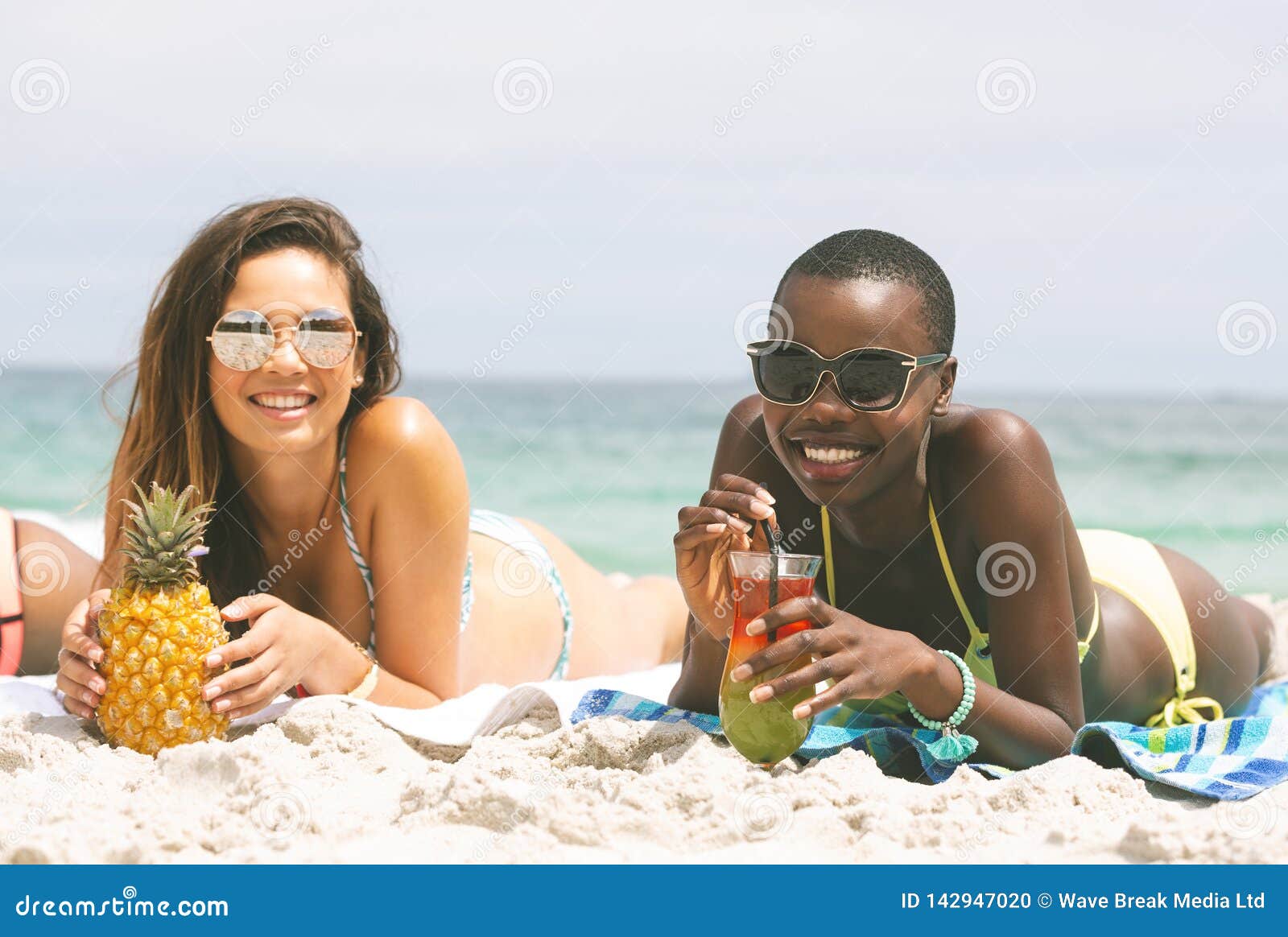Women Lying At Beach While Having Pineapple Stock Photo Image Of Amusing Ethnicity