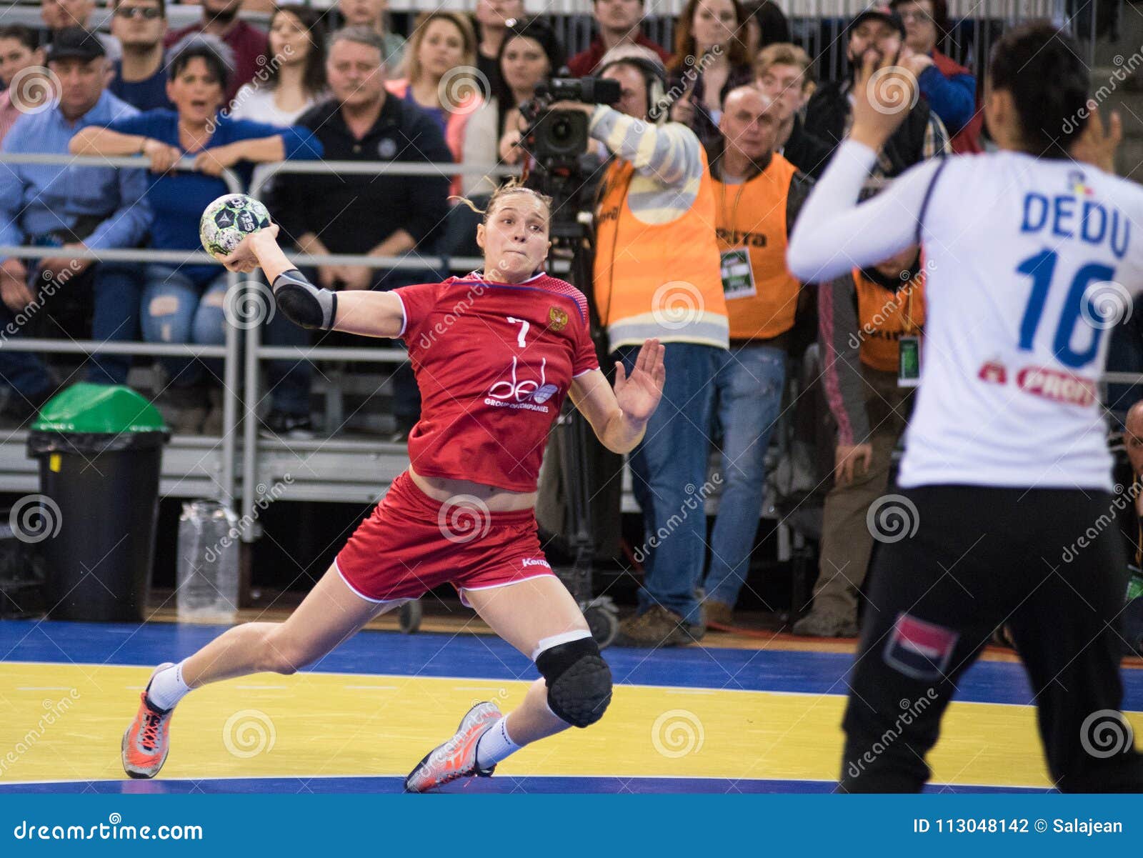 Women playing handball editorial photography. Image of floor - 113048142