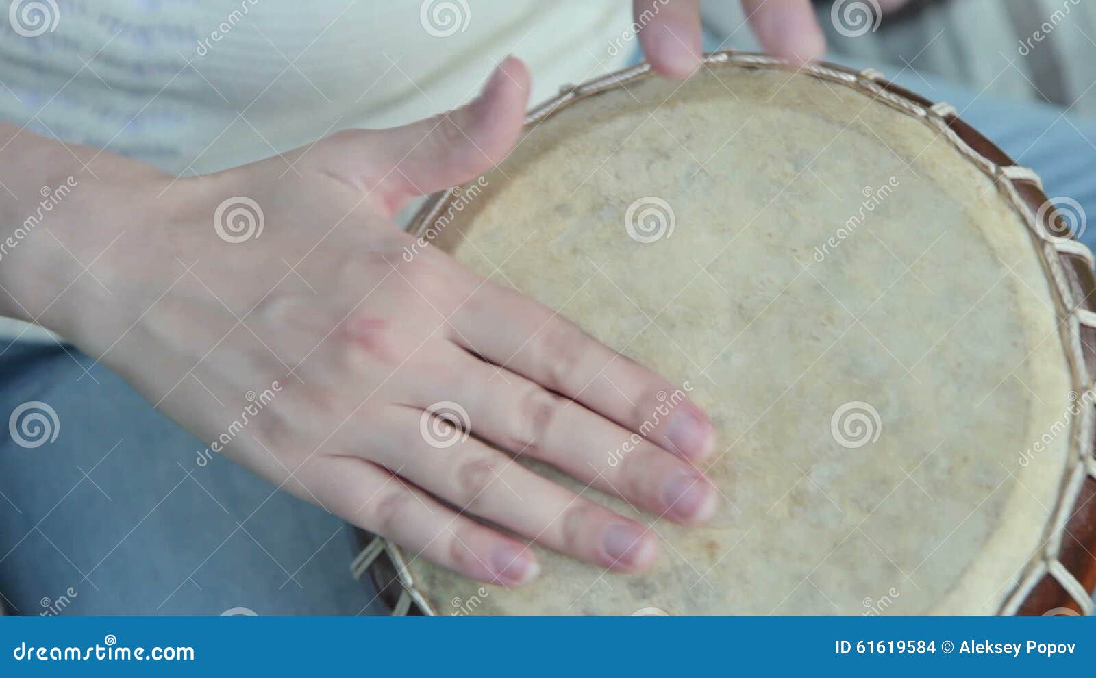Women Playing on Jambe Drum on Nature Stock Footage Video of