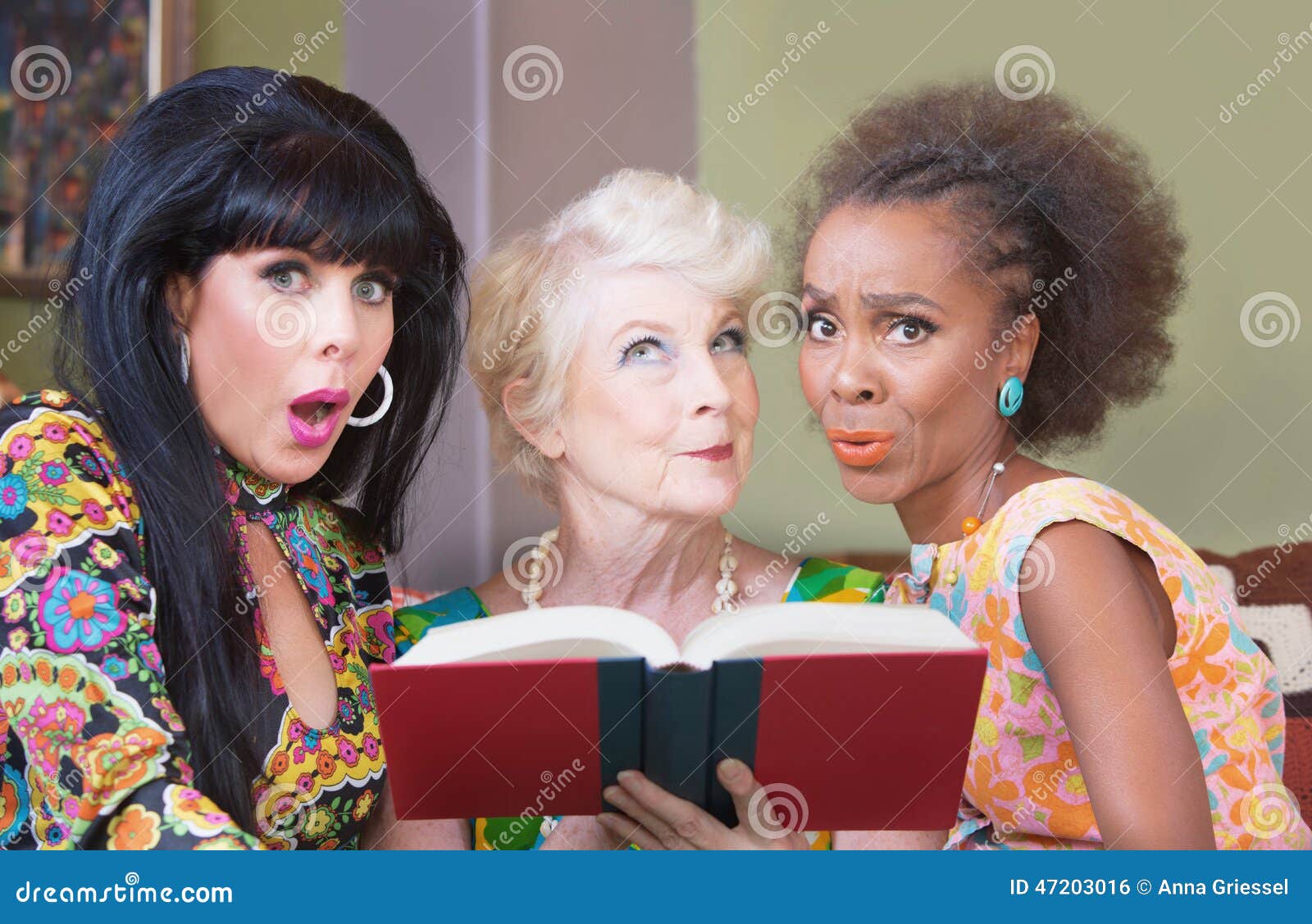women reading a romance novel