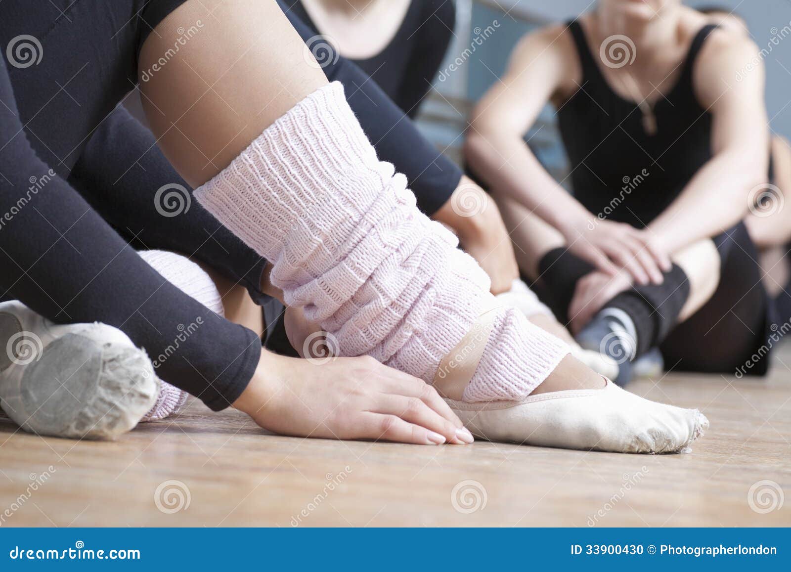 women relaxing in ballet rehearsal room