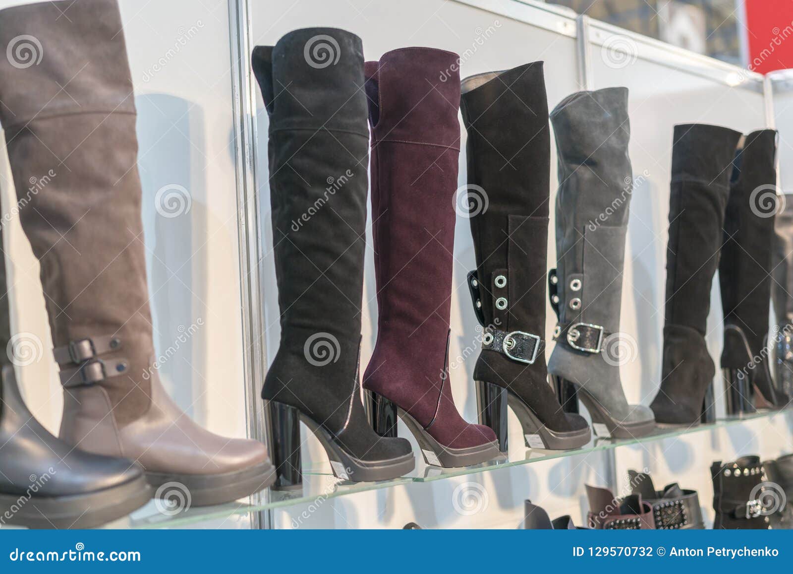 Women`s Boots on the Shelves in the Store. Pavilion of the Store with ...