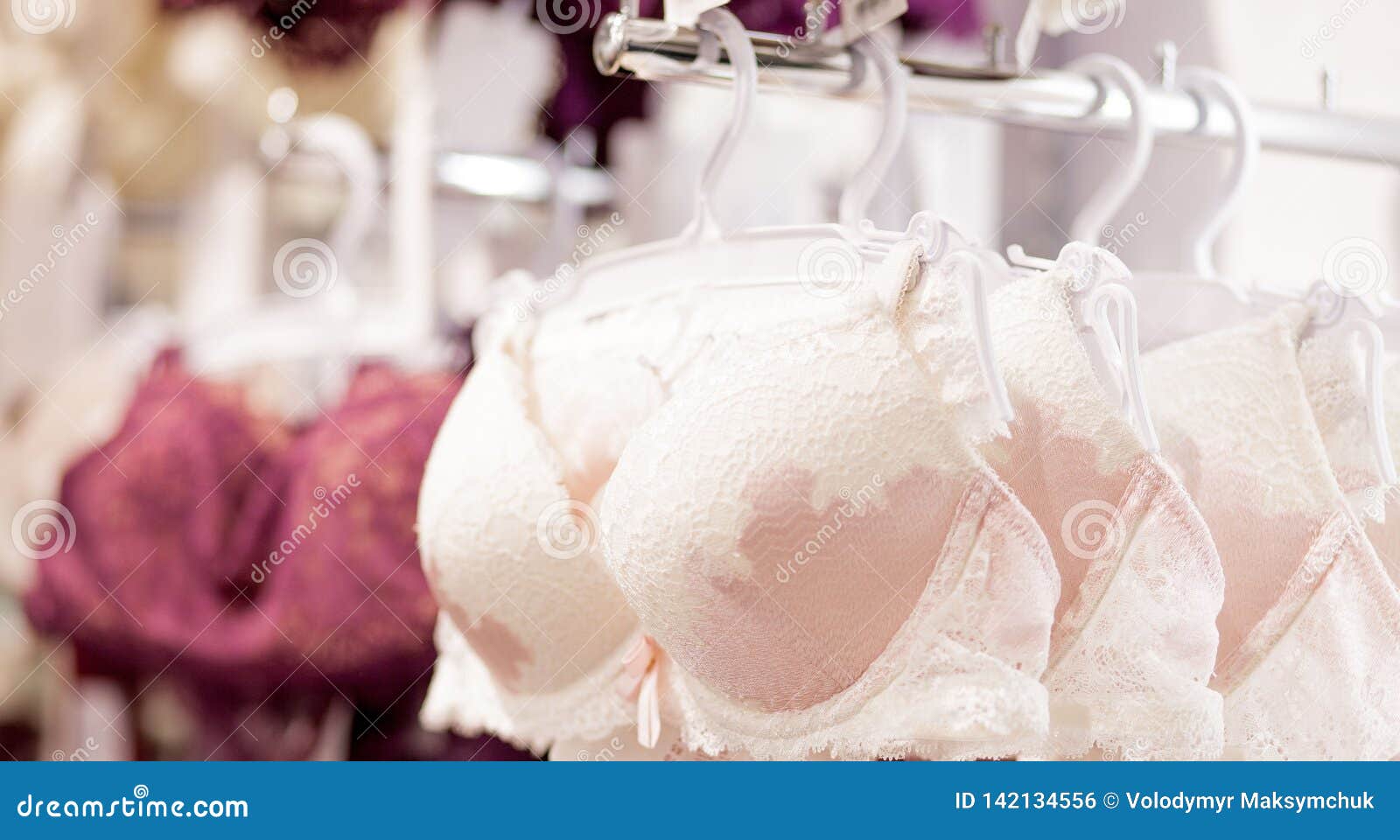 Female lingerie store showcase. Bras on hangers. High-quality women  underwear boutique. Different styles and patterns of bras. Attractive  romantic and home clothes shop. Stock Video Footage by ©artiemedvedev  #325115234