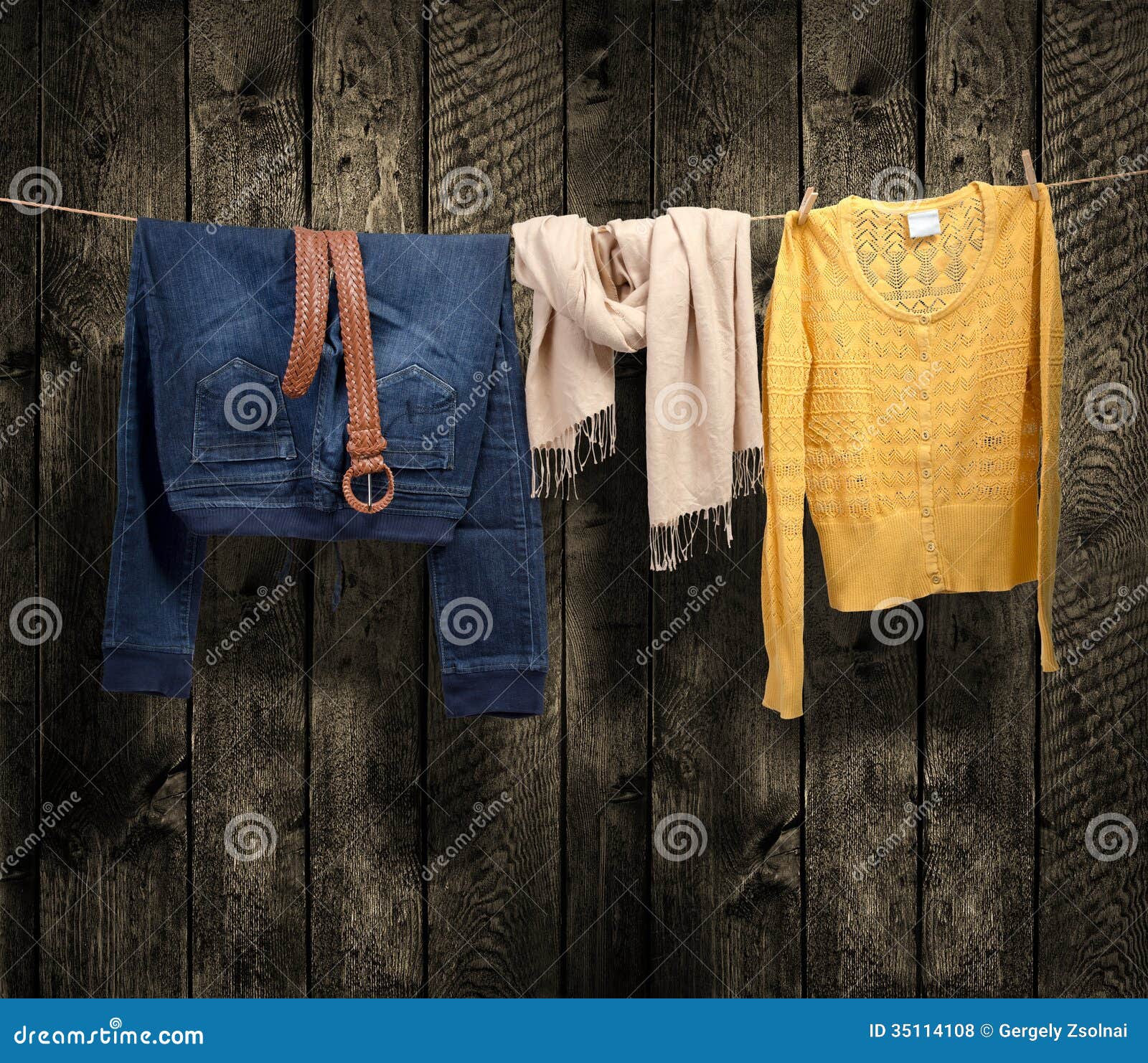 Women S Clothing on a Clothesline on Wood Background Stock Photo ...