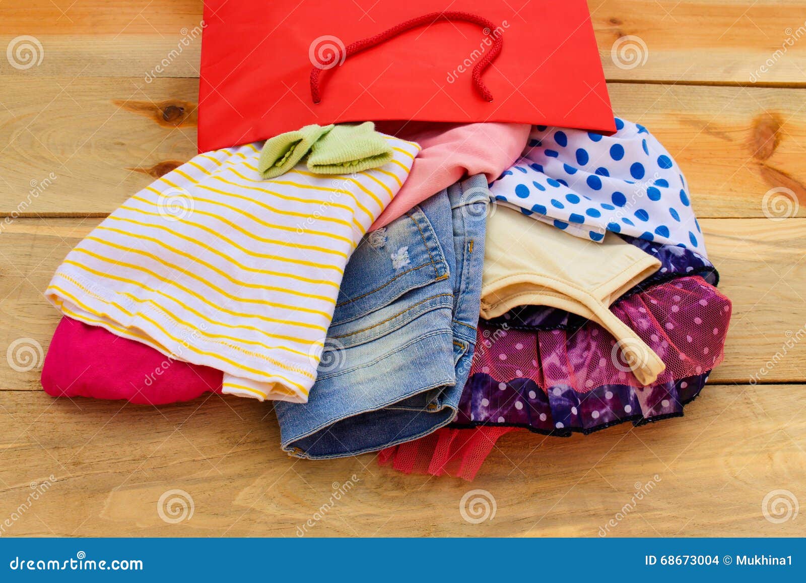 Women S Clothing Falls Out of Paper Shopping Bags Stock Photo - Image ...