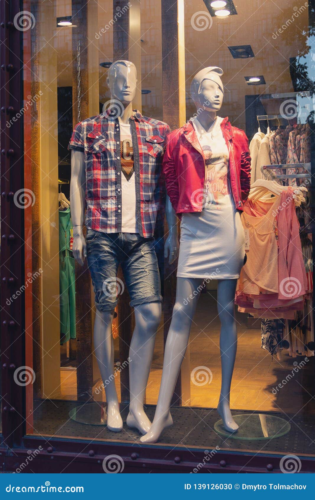 Women`s Clothing on Two Mannequins in a Shop Window Stock Photo - Image ...