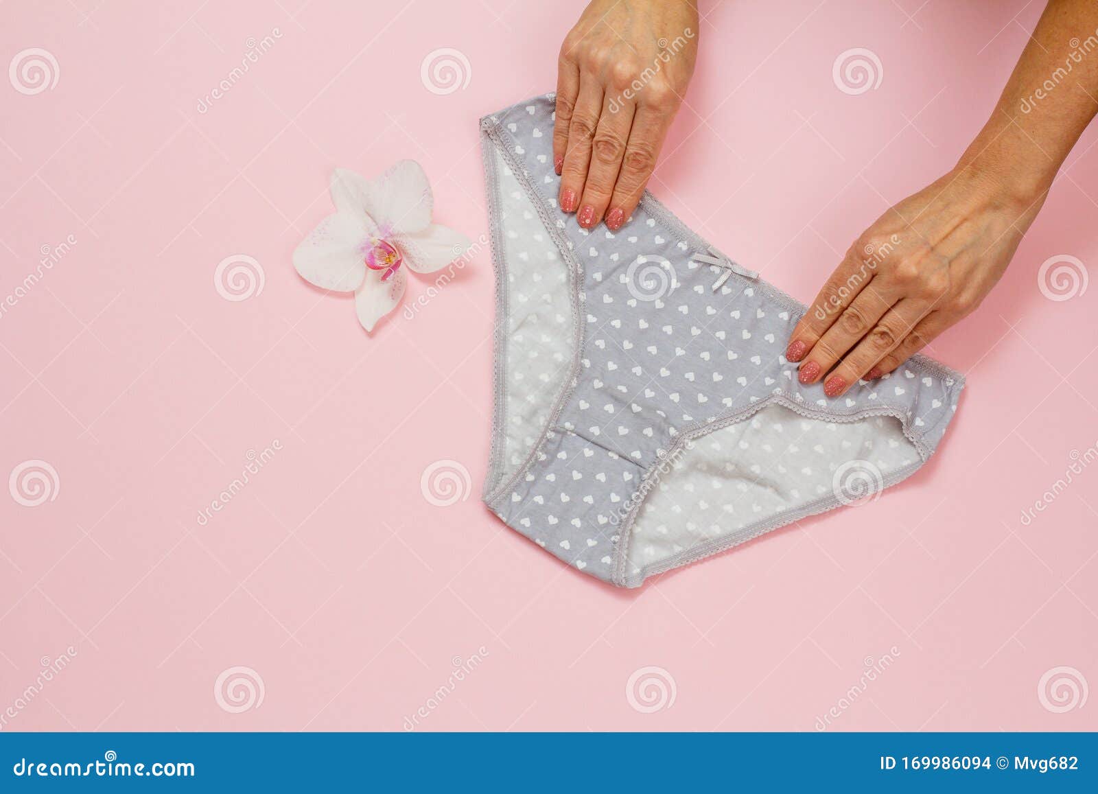 Women`s Hands with Beautiful Panties on Pink Background Stock Photo ...