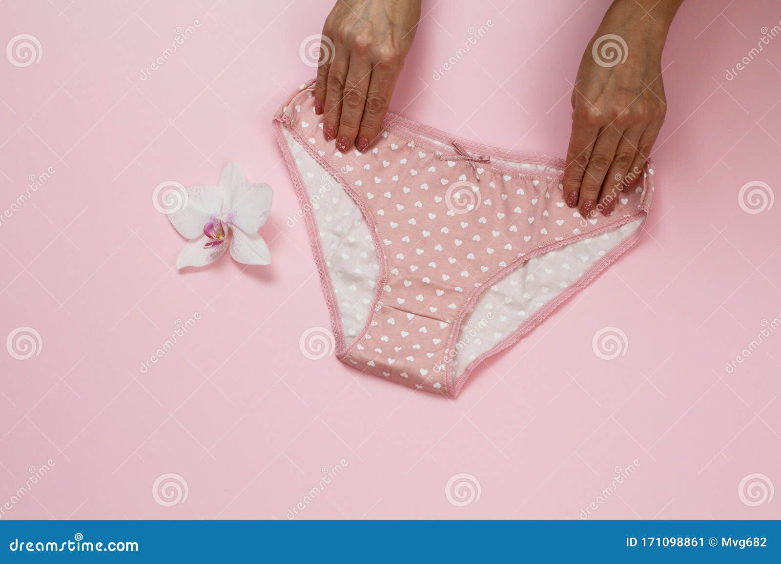 Women`s Hands with Beautiful Panties on Pink Background Stock Image ...