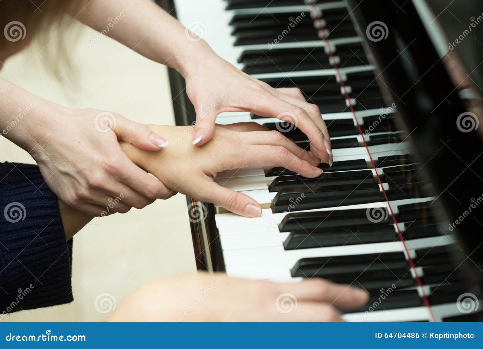 Women S Hands on the Keyboard of Piano. Girl Plays Stock Photo - Image