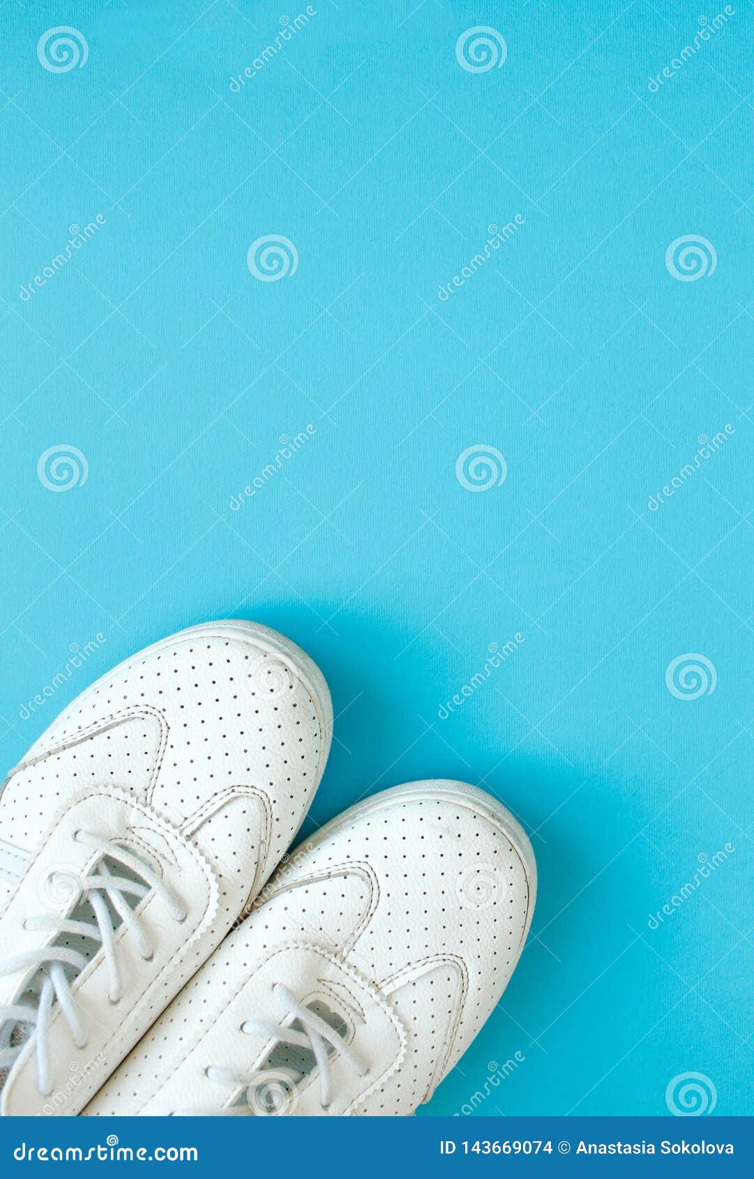 Women`s Sneakers on a Blue Background Top View. Stock Photo - Image of ...