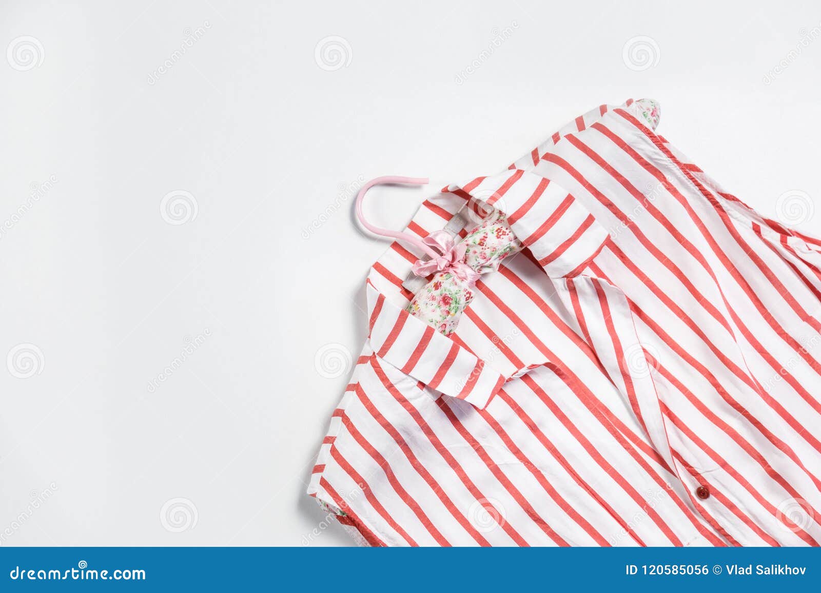 Women`s Striped Shirt with Hanger Isolated on White. Stock Photo ...