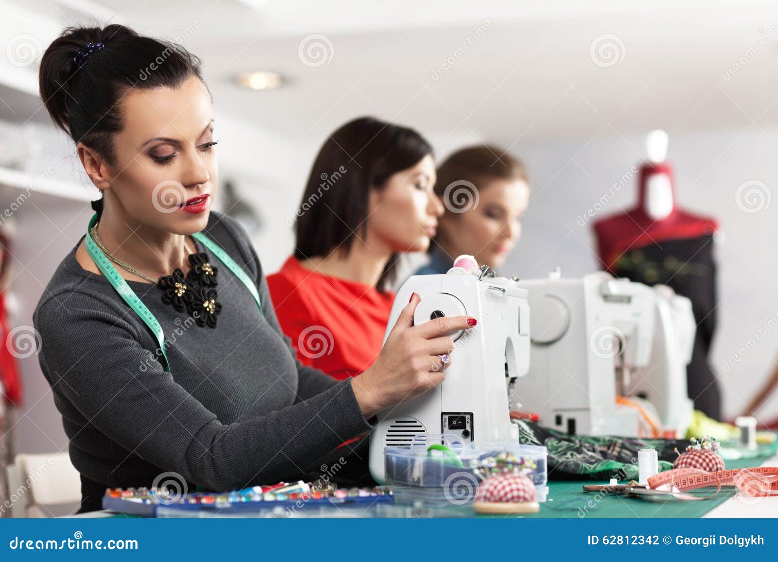 Women in a sewing stock photo. Image of occupation 62812342